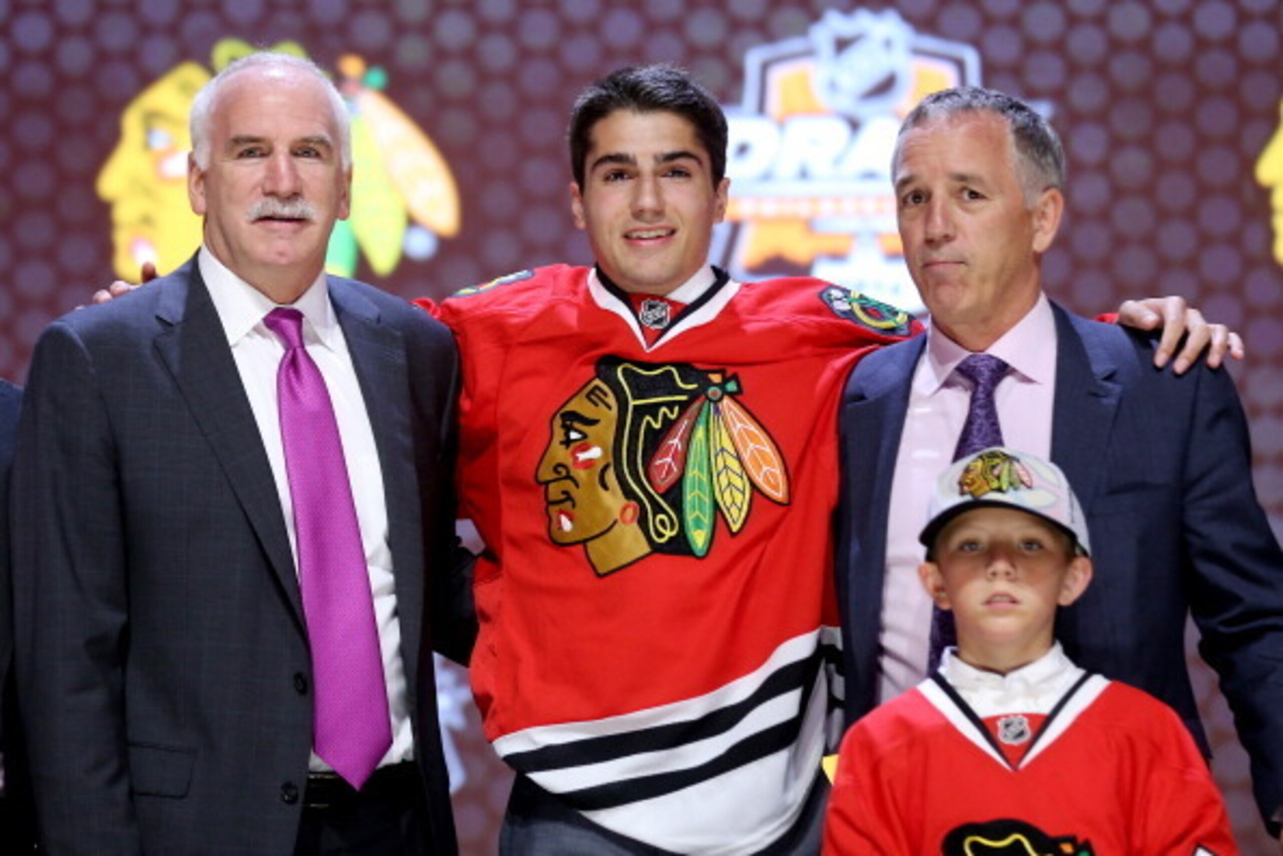 PHILADELPHIA, PA - JUNE 27:  Nick Schmaltz is selected twentieth overall by the Chicago Blackhawks in the first round of the 2014 NHL Draft at the Wells Fargo Center on June 27, 2014 in Philadelphia, Pennsylvania.  (Photo by Bruce Bennett/Getty Images)