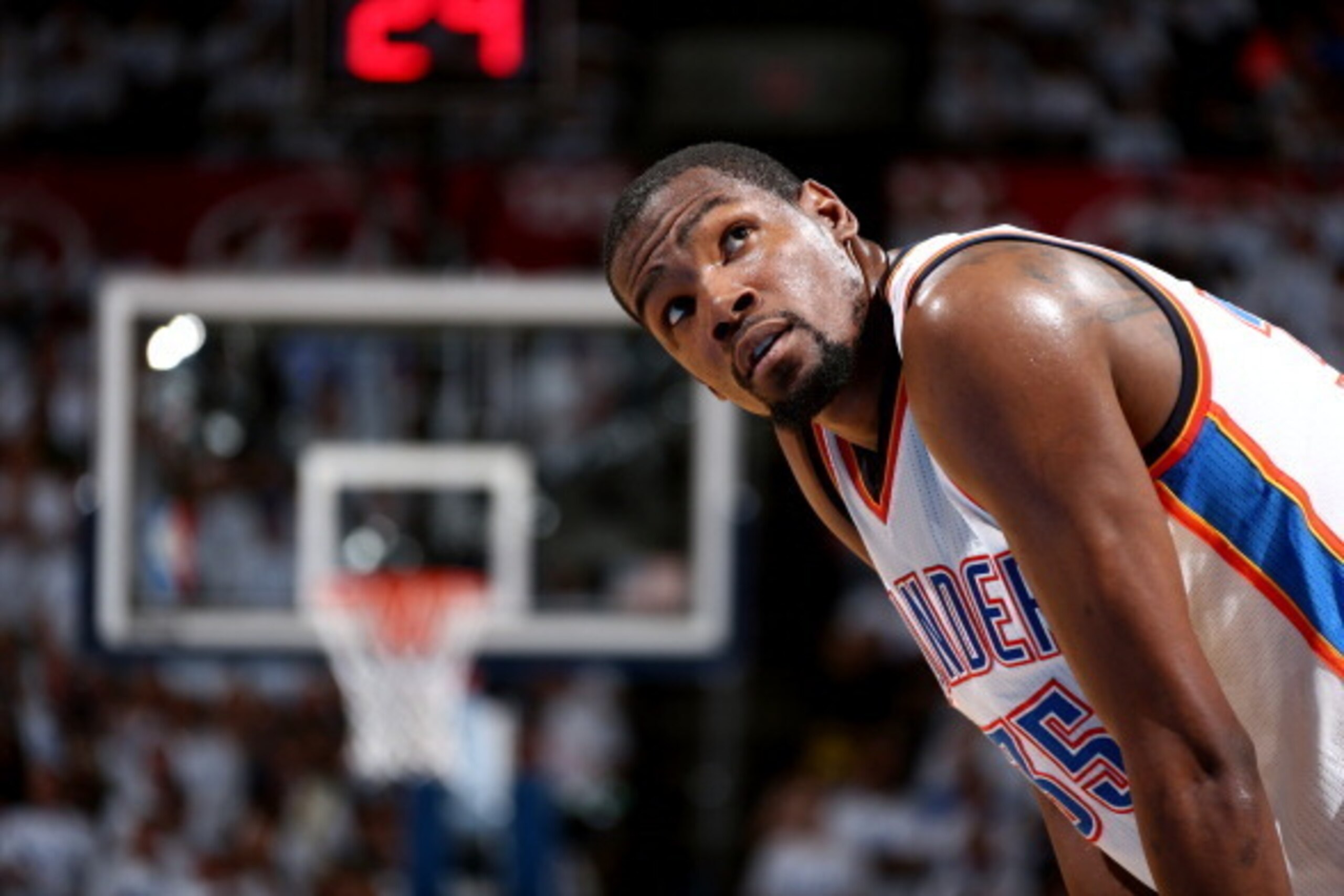 OKLAHOMA CITY, OK - May 31: Kevin Durant #35 of the Oklahoma City Thunder stands on the court during a game against the San Antonio Spurs in Game 6 of the Western Conference Finals during the 2014 NBA Playoffs at the Chesapeake Arena on May 31, 2014 in Ok