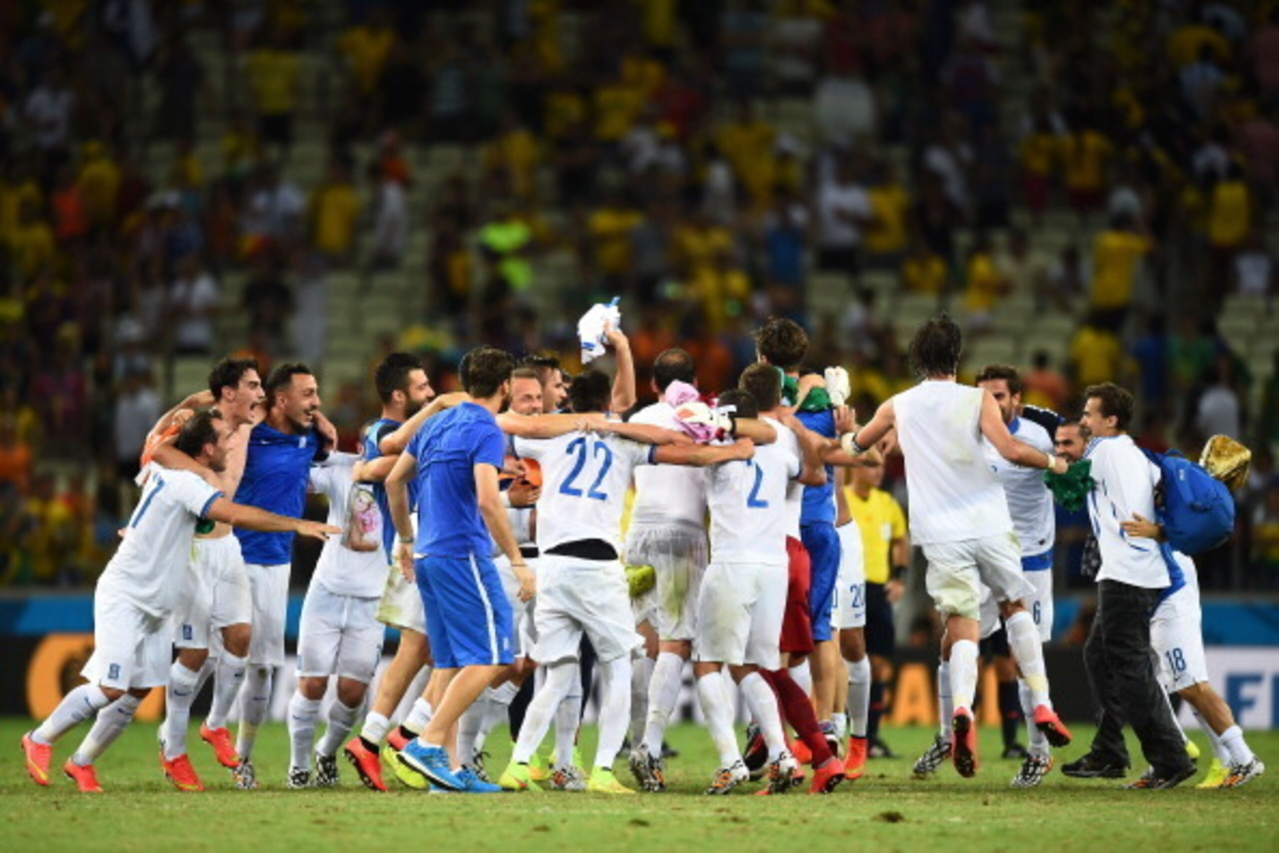 FORTALEZA, BRAZIL - JUNE 24:  Greece celebrate after defeating the Ivory Coast 2-1 during the 2014 FIFA World Cup Brazil Group C match between Greece and the Ivory Coast at Castelao on June 24, 2014 in Fortaleza, Brazil.  (Photo by Laurence Griffiths/Gett