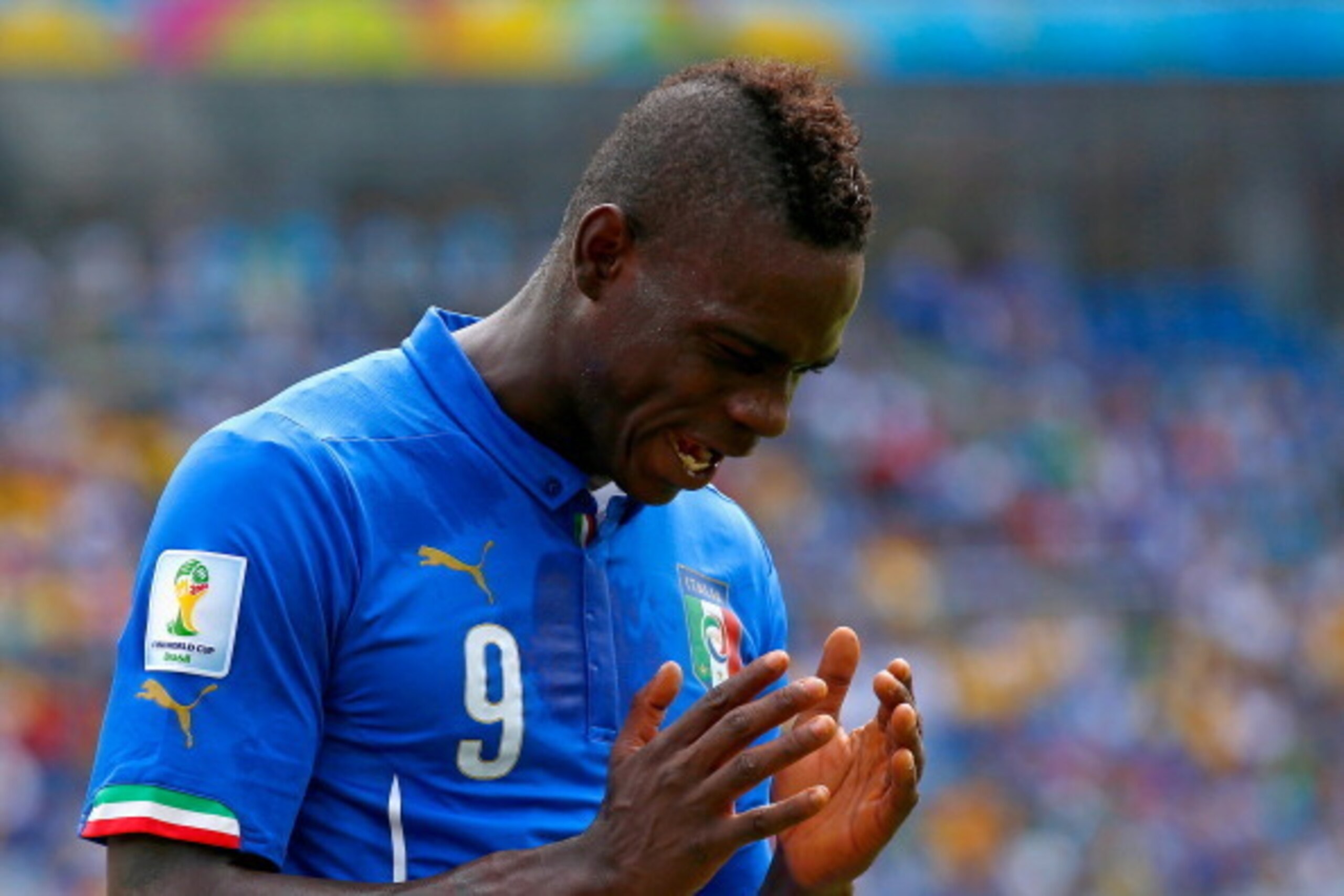 NATAL, BRAZIL - JUNE 24:  Mario Balotelli of Italy reacts during the 2014 FIFA World Cup Brazil Group D match between Italy and Uruguay at Estadio das Dunas on June 24, 2014 in Natal, Brazil.  (Photo by Clive Rose/Getty Images)