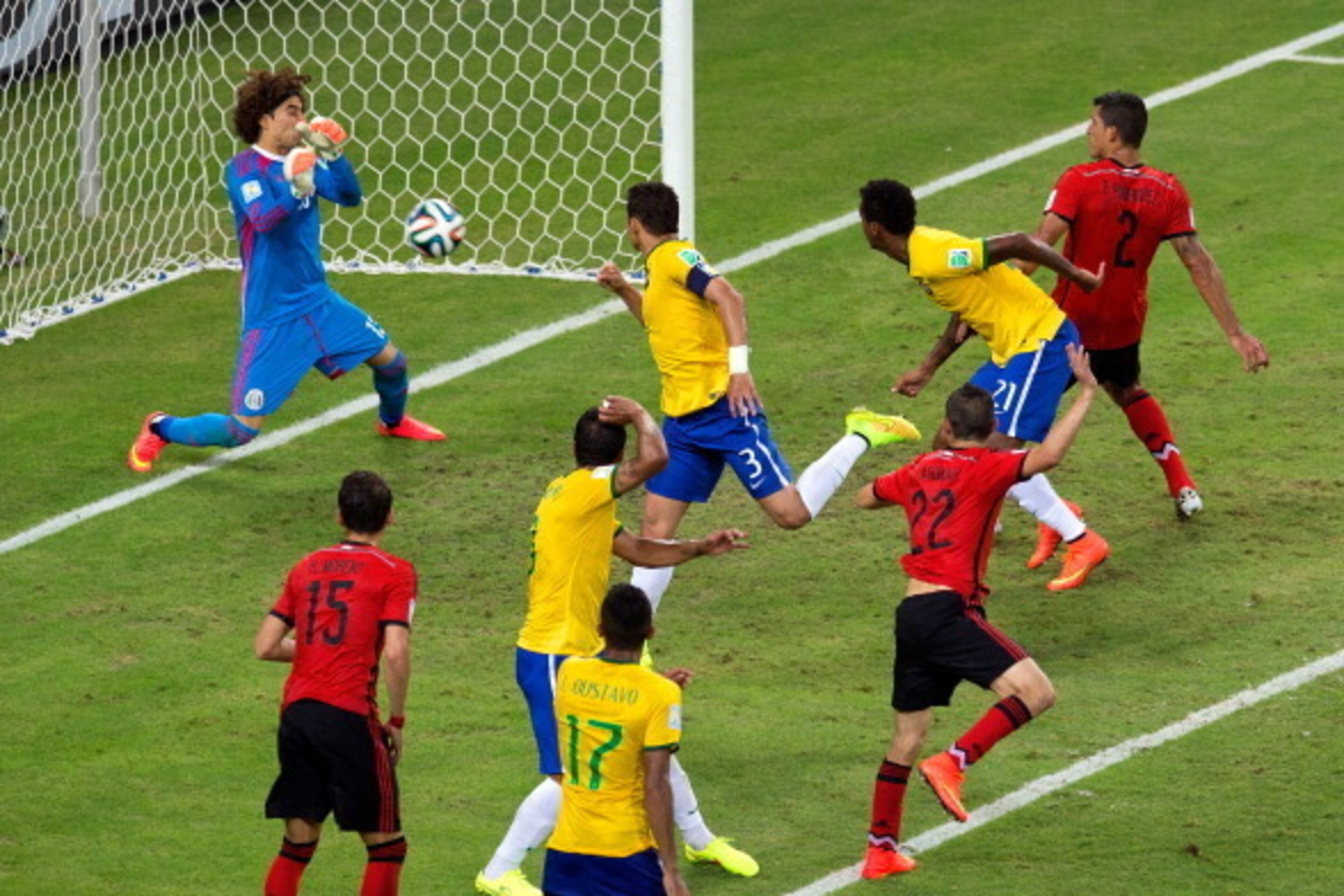 FORTALEZA, BRAZIL - JUNE 17: Guillermo Ochoa of Mexico makes a save after a header by Thiago Silva of Brazil during the 2014 FIFA World Cup Brazil Group A match between Brazil and Mexico at Castelao on June 17, 2014 in Fortaleza, Brazil. (Photo by Migue FORTALEZA, BRAZIL - JUNE 17: Guillermo Ochoa of Mexico makes a save after a header by Thiago Silva of Brazil during the 2014 FIFA World Cup Brazil Group A match between Brazil and Mexico at Castelao on June 17, 2014 in Fortaleza, Brazil. (Photo by Migue