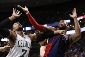 Mar 9, 2014; Boston, MA, USA; Boston Celtics center Jared Sullinger (7) blocks out against Detroit Pistons power forward Greg Monroe (10) during the first half at TD Garden. Mandatory Credit: Mark L. Baer-USA TODAY Sports