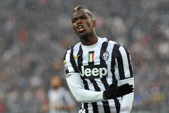 TURIN, ITALY - APRIL 19:  Paul Pogba of Juventus reacts during the Serie A match between Juventus and Bologna FC at Juventus Arena on April 19, 2014 in Turin, Italy.  (Photo by Valerio Pennicino/Getty Images)
