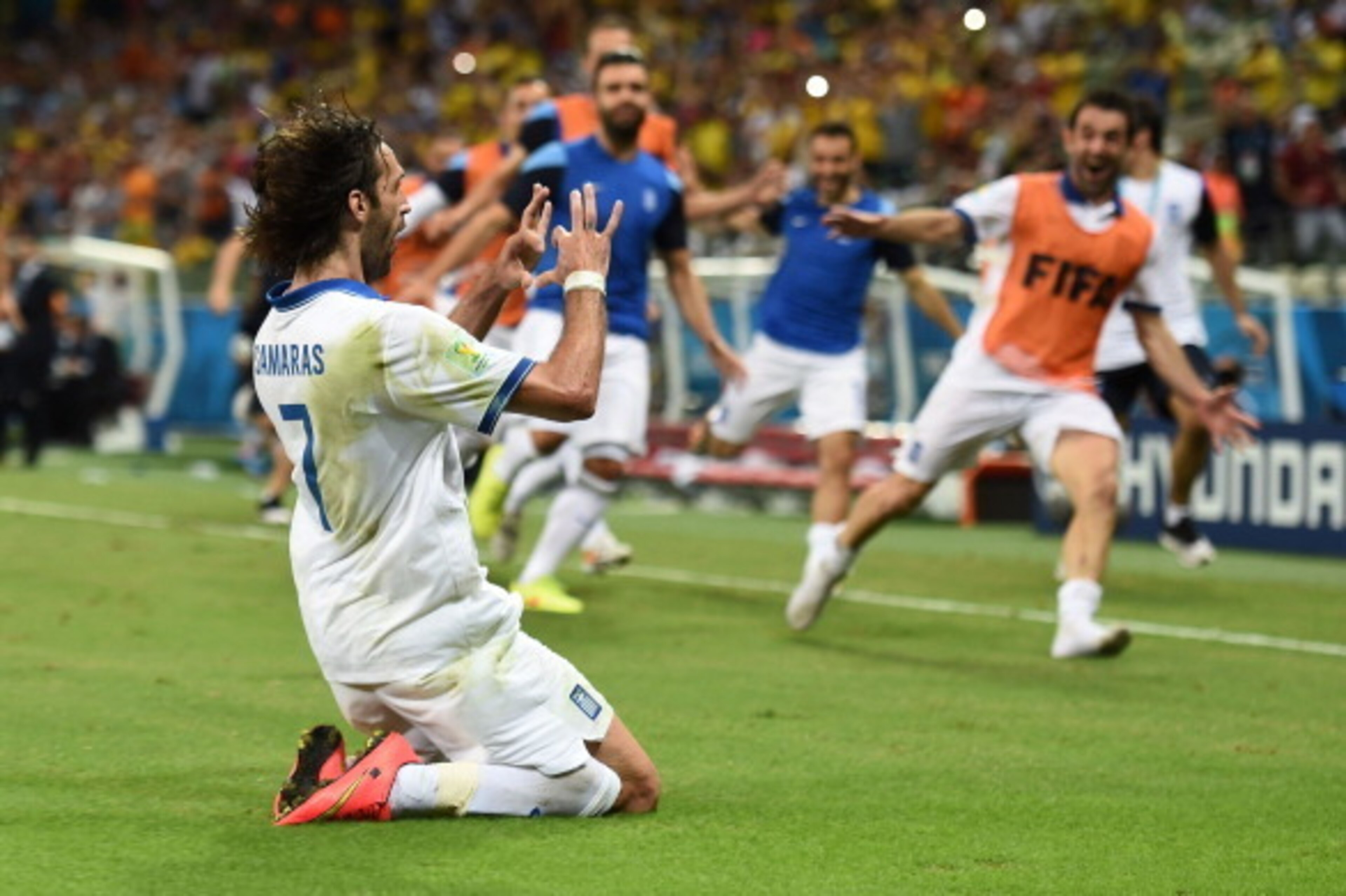 FORTALEZA, BRAZIL - JUNE 24:  Giorgos Samaras of Greece celebrates scoring his team's second goal on a penalty kick during the 2014 FIFA World Cup Brazil Group C match between Greece and the Ivory Coast at Castelao on June 24, 2014 in Fortaleza, Brazil.  