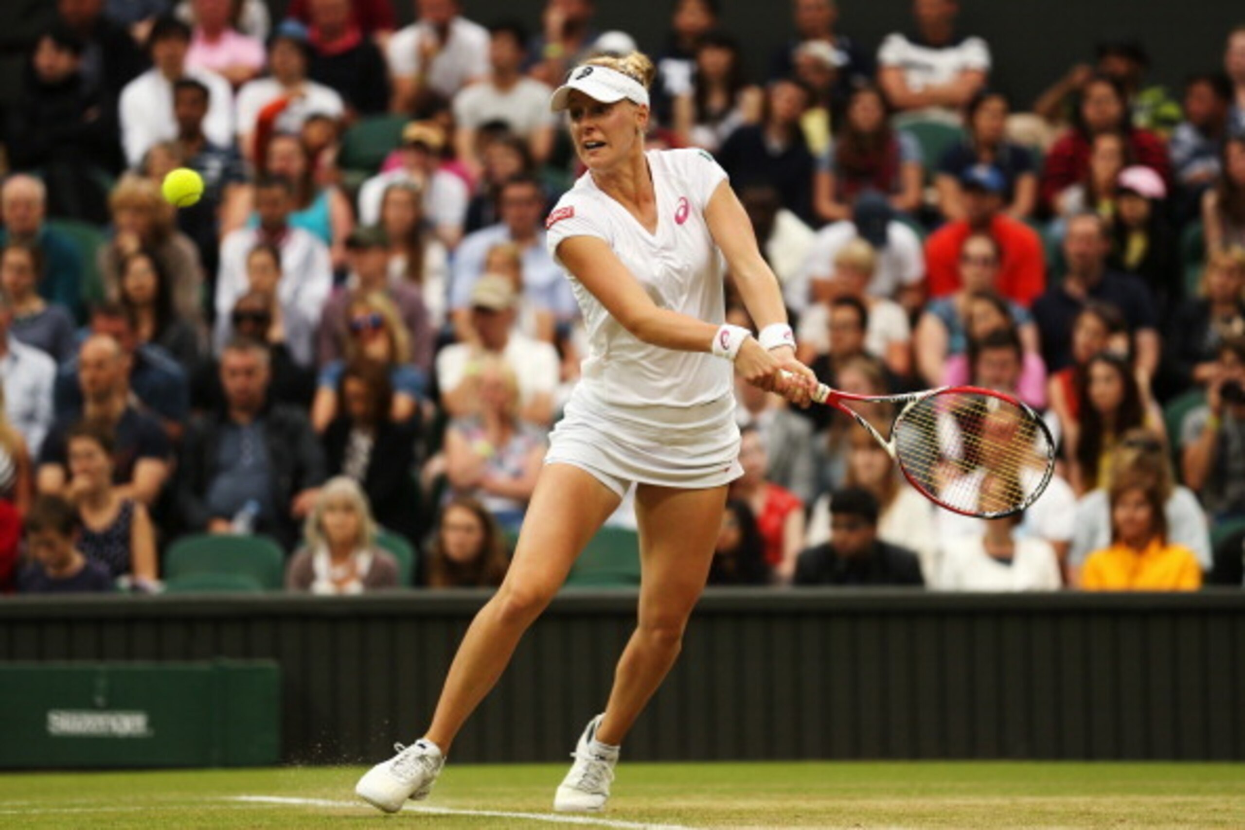 LONDON, ENGLAND - JUNE 28: Alison Riske of the United States hits a backhand return during her Ladies' Singles third round match against Maria Sharapova of Russia on day six of the Wimbledon Lawn Tennis Championships at the All England Lawn Tennis and Cr LONDON, ENGLAND - JUNE 28: Alison Riske of the United States hits a backhand return during her Ladies' Singles third round match against Maria Sharapova of Russia on day six of the Wimbledon Lawn Tennis Championships at the All England Lawn Tennis and Cr