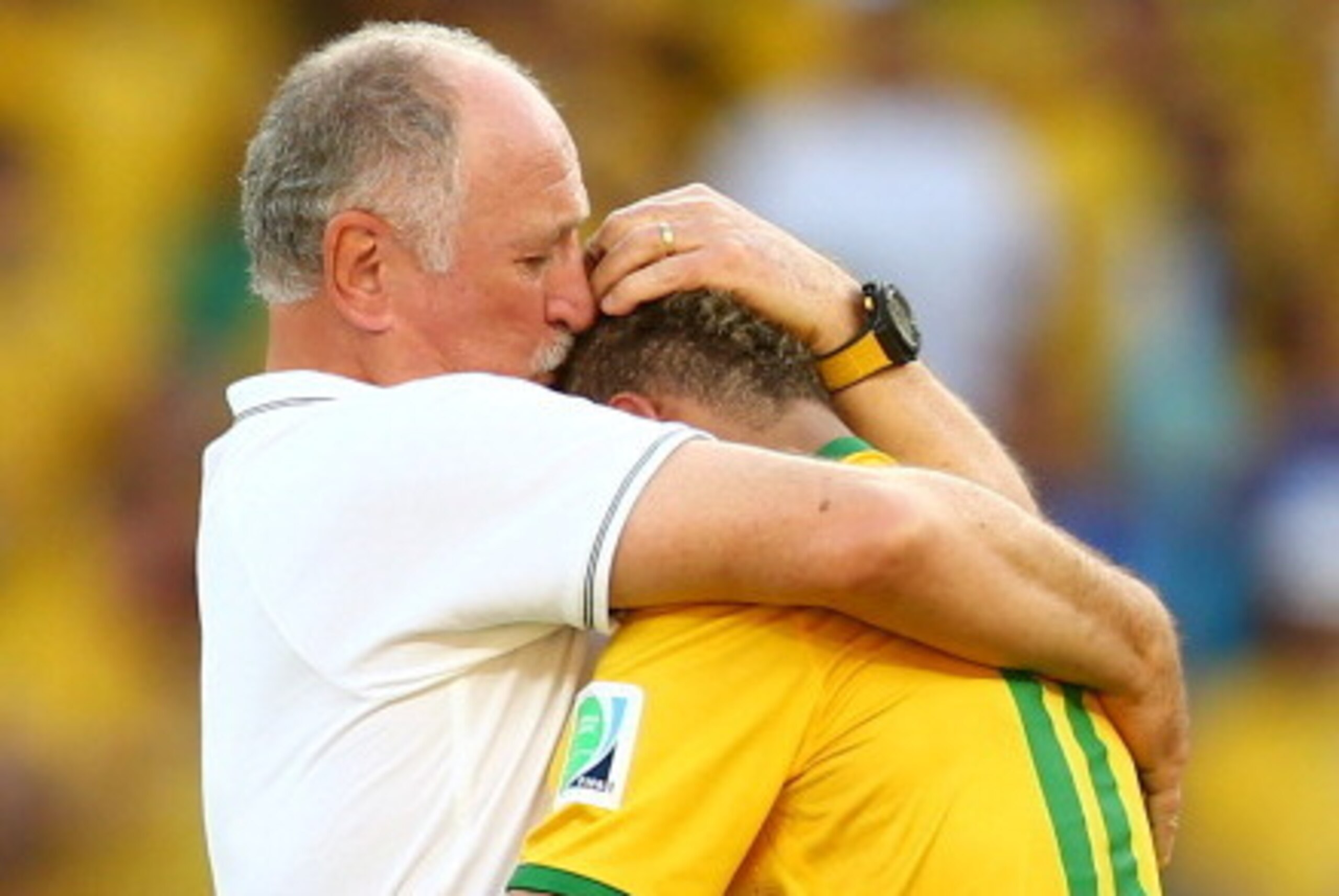 BELO HORIZONTE, BRAZIL - JUNE 28:  Head coach Luiz Felipe Scolari of Brazil celebrates with Neymar after defeating Chile in a penalty shootout during the 2014 FIFA World Cup Brazil round of 16 match between Brazil and Chile at Estadio Mineirao on June 28,