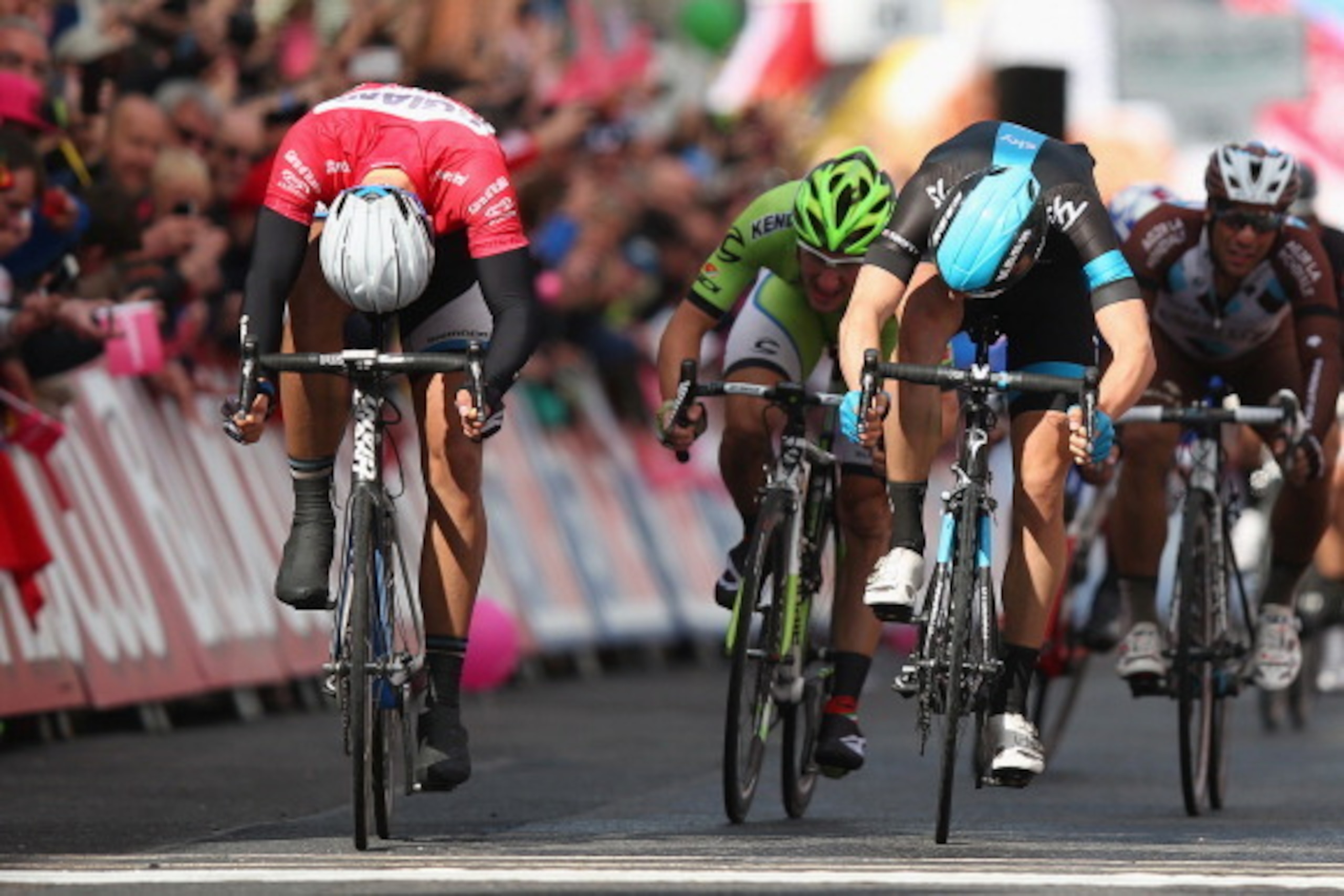 DUBLIN, IRELAND - MAY 11:  Marcel Kittel of Germany and Giant-Shimano (L) narrowly beats Ben Swift of Great Britain and Team SKY (R) to win the third stage of the 2014 Giro d'Italia, a 187km stage between Armagh and Dublin on May 11, 2014 in Dublin, Irela