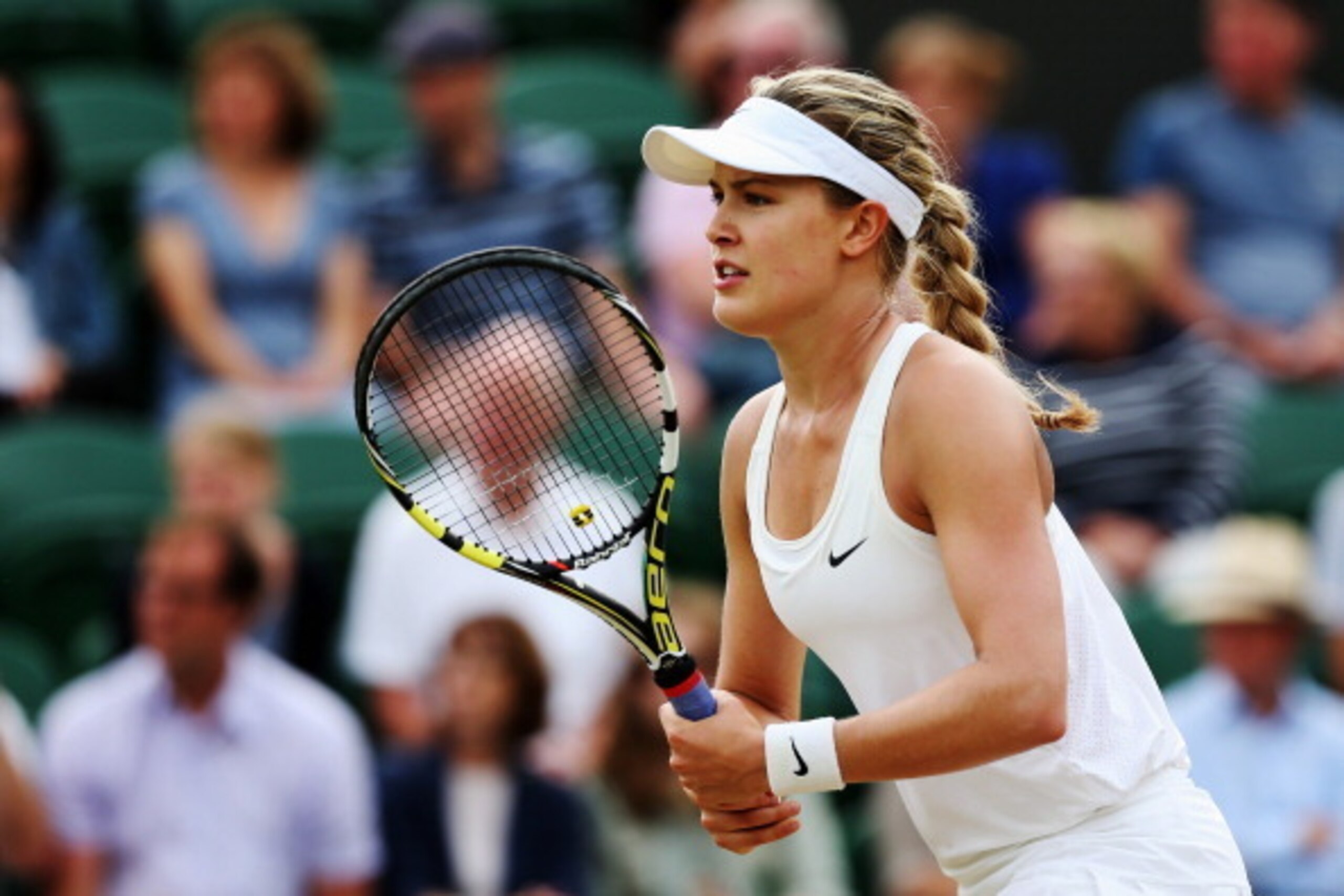 LONDON, ENGLAND - JUNE 26:  Eugenie Bouchard of Canada during her Ladies' Singles second round match against Silvia Soler-Espinosa of Spain on day four of the Wimbledon Lawn Tennis Championships at the All England Lawn Tennis and Croquet Club at Wimbledon