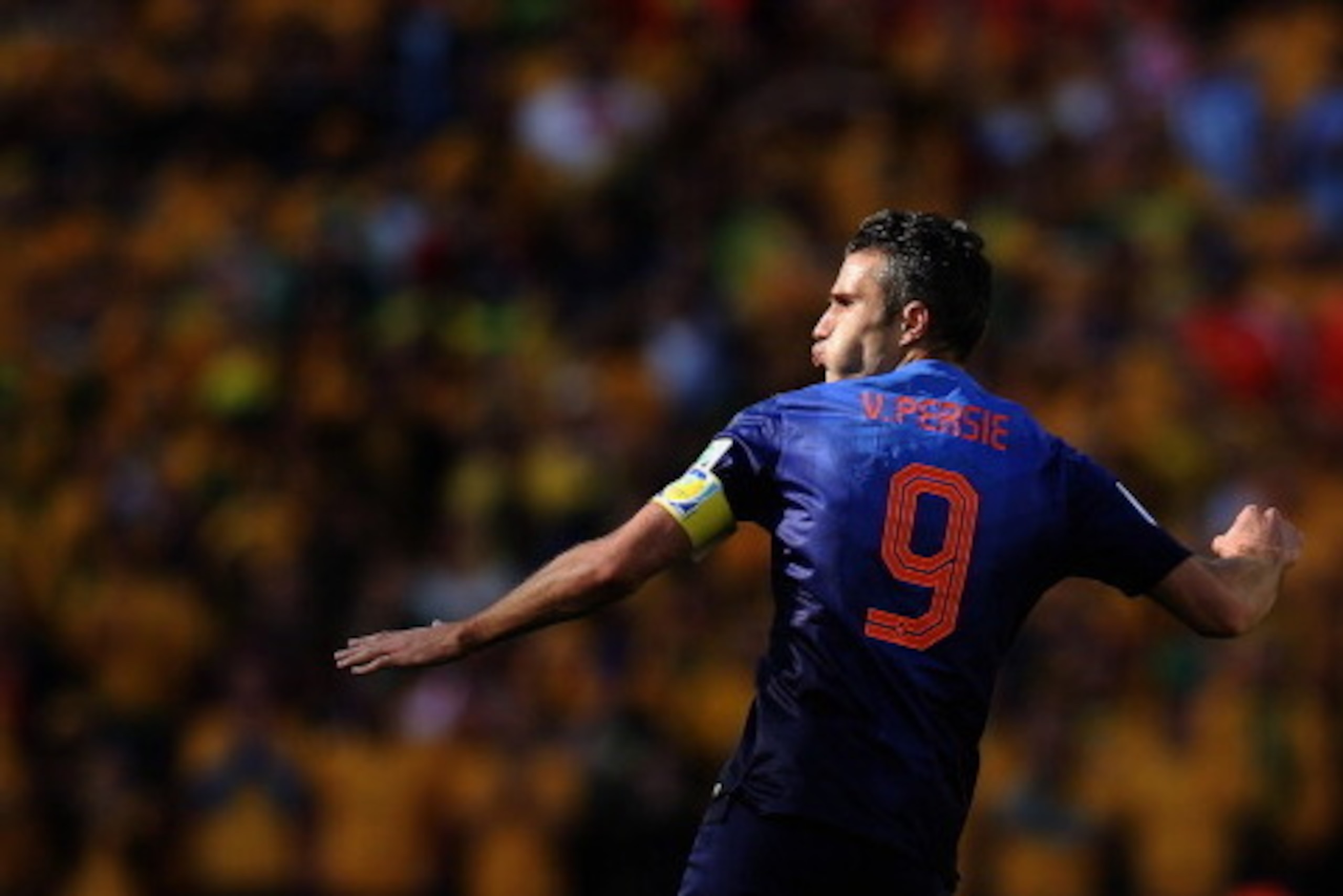 PORTO ALEGRE, BRAZIL - JUNE 18:  Robin van Persie of the Netherlands celebrates scoring his team's second goal during the 2014 FIFA World Cup Brazil Group B match between Australia and Netherlands at Estadio Beira-Rio on June 18, 2014 in Porto Alegre, Bra