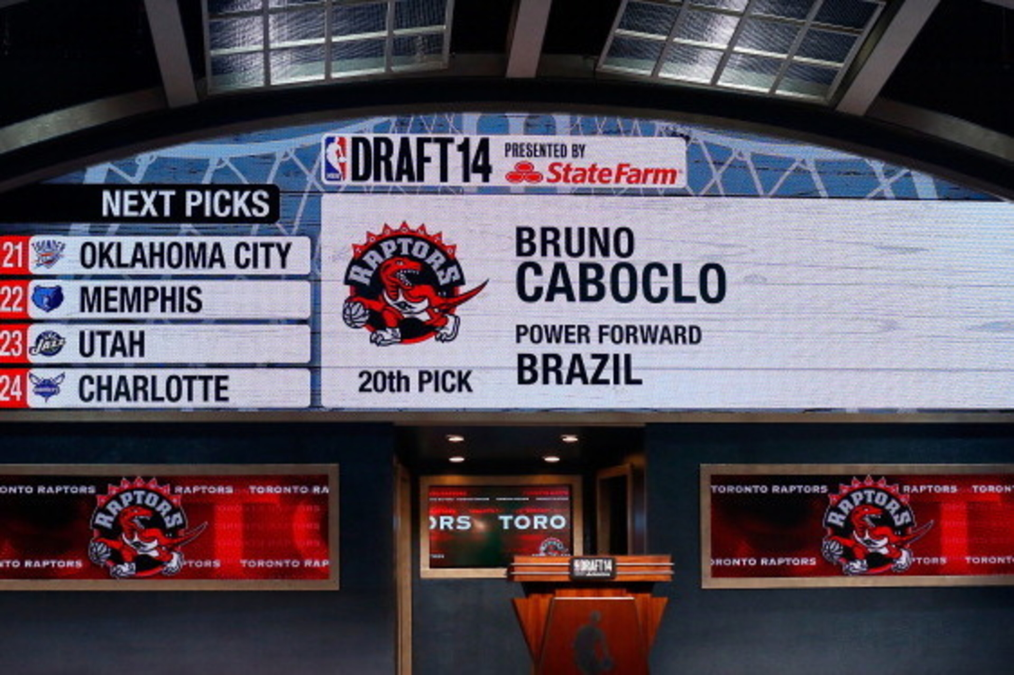 NEW YORK, NY - JUNE 26:  A video screen shows the selection of Bruno Caboclo of Brazil as the #20 overall pick in the first round by the Toronto Rapters during the 2014 NBA Draft at Barclays Center on June 26, 2014 in the Brooklyn borough of New York City