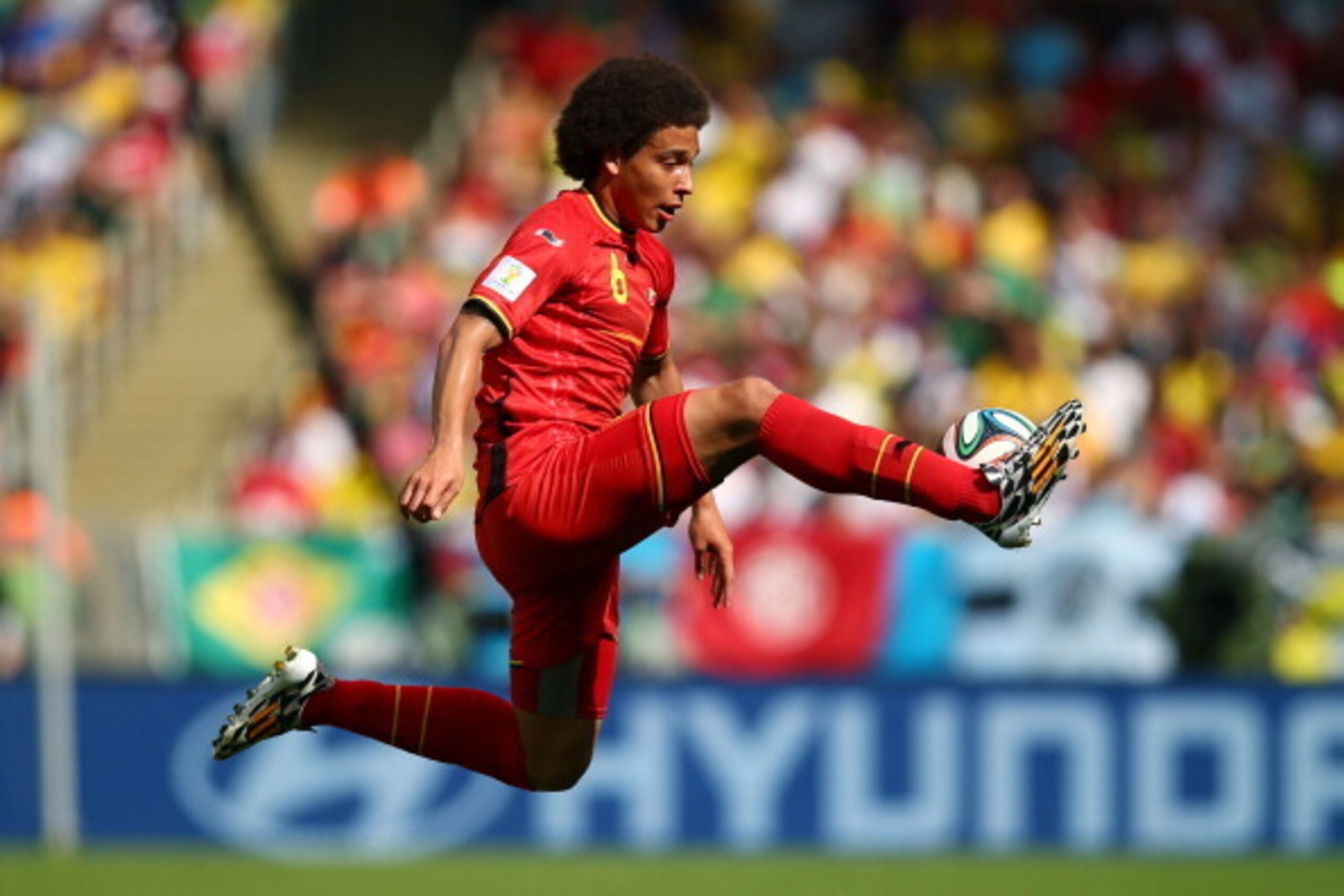 RIO DE JANEIRO, BRAZIL - JUNE 22:  Axel Witsel of Belgium controls the ball during the 2014 FIFA World Cup Brazil Group H match between Belgium and Russia at Maracana on June 22, 2014 in Rio de Janeiro, Brazil.  (Photo by Clive Rose/Getty Images)