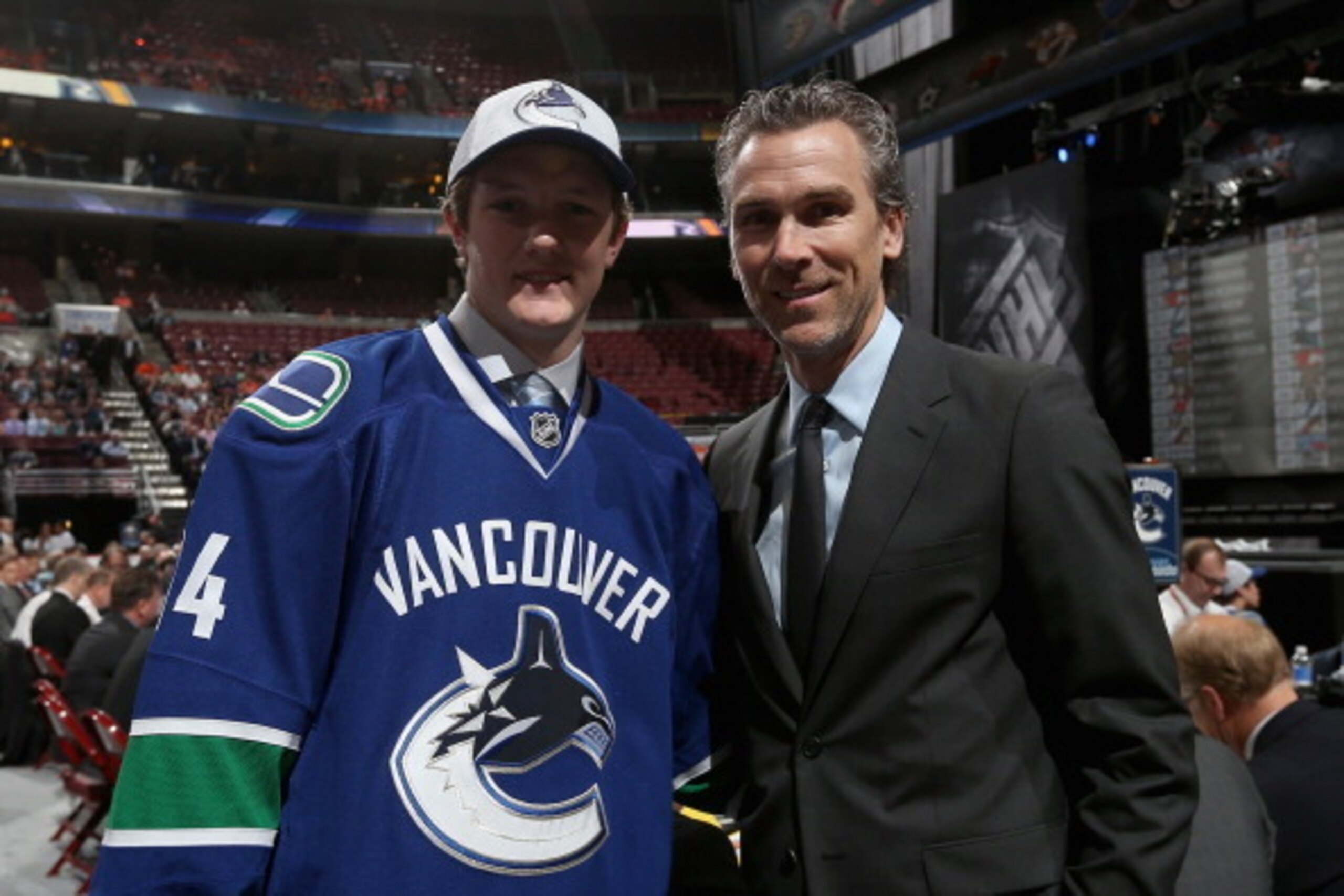 PHILADELPHIA, PA - JUNE 28:  Thatcher Demko of the Vancouver Canucks meets with team President Trevor Linden after being drafted on Day Two of the 2014 NHL Draft at the Wells Fargo Center on June 28, 2014 in Philadelphia, Pennsylvania.  (Photo by Bruce Be