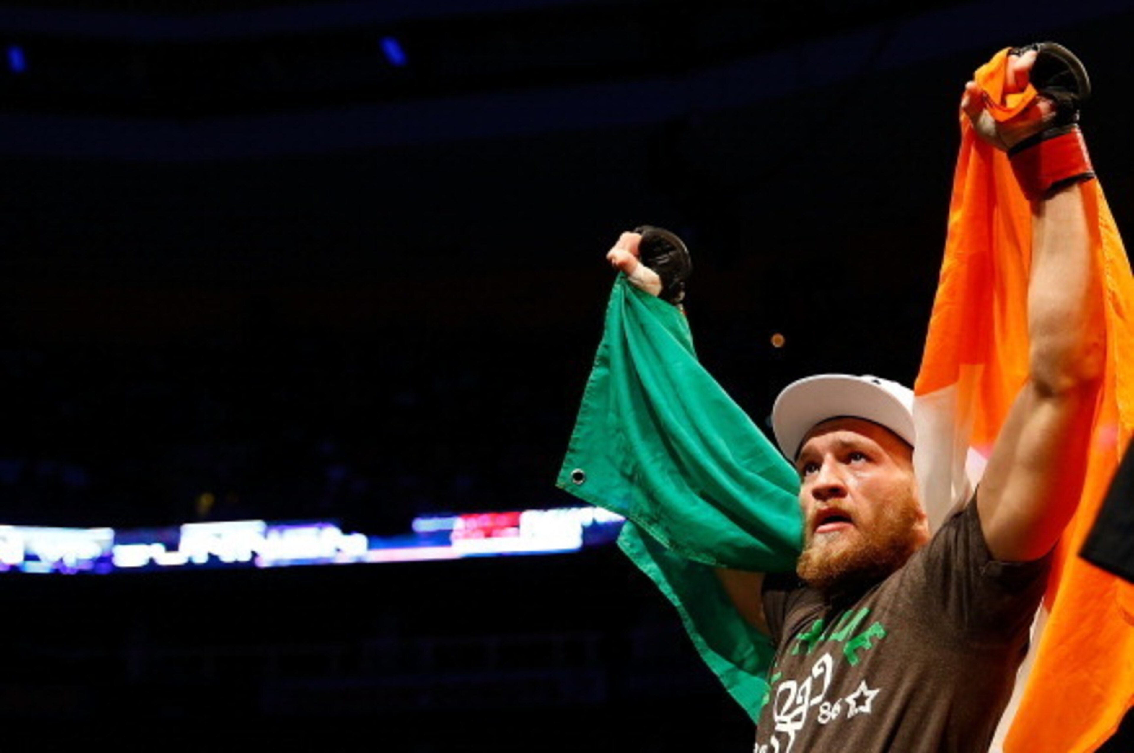 BOSTON, MA - AUGUST 17: Conor McGregor celebrates following his win against Max Holloway in their featherweight bout at TD Garden on August 17, 2013 in Boston, Massachusetts. (Photo by Jared Wickerham/Getty Images)