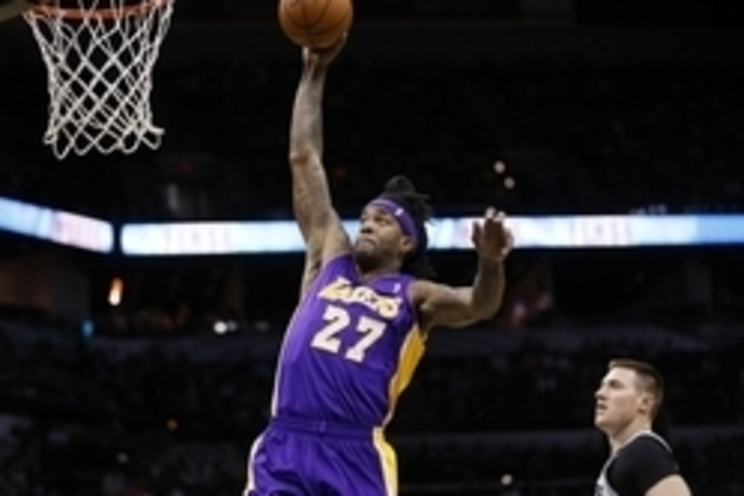 Apr 16, 2014; San Antonio, TX, USA; Los Angeles Lakers forward Jordan Hill (27) dunks the ball against the San Antonio Spurs during the first half at AT&T Center. Mandatory Credit: Soobum Im-USA TODAY Sports