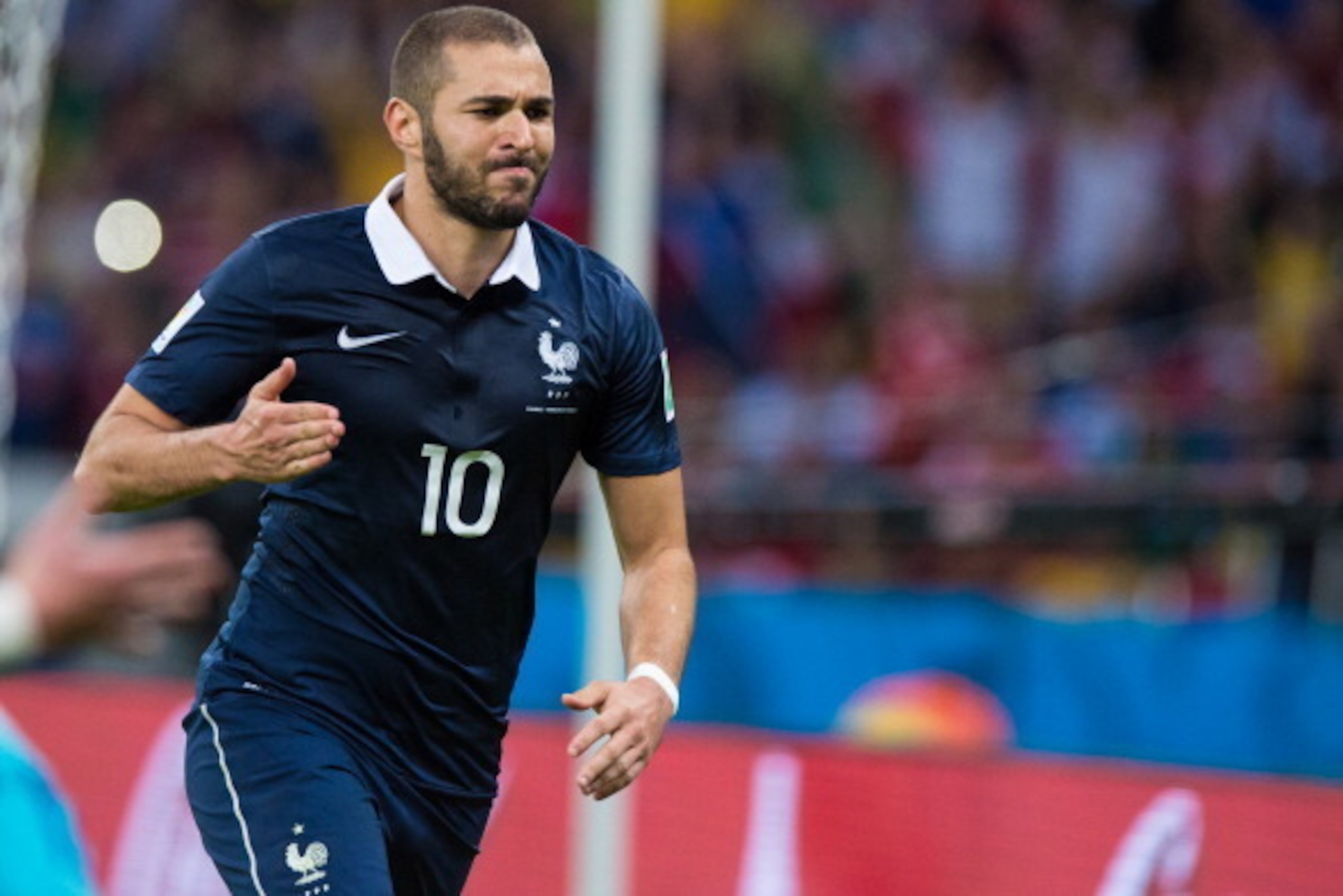 PORTO ALEGRE, BRAZIL - JUNE 15: Karim Benzema of France celebrates after scoring his team's third goal during the 2014 FIFA World Cup Brazil Group E match between France and Honduras at Estadio Beira-Rio on June 15, 2014 in Porto Alegre, Brazil. (Photo by PORTO ALEGRE, BRAZIL - JUNE 15: Karim Benzema of France celebrates after scoring his team's third goal during the 2014 FIFA World Cup Brazil Group E match between France and Honduras at Estadio Beira-Rio on June 15, 2014 in Porto Alegre, Brazil. (Photo by