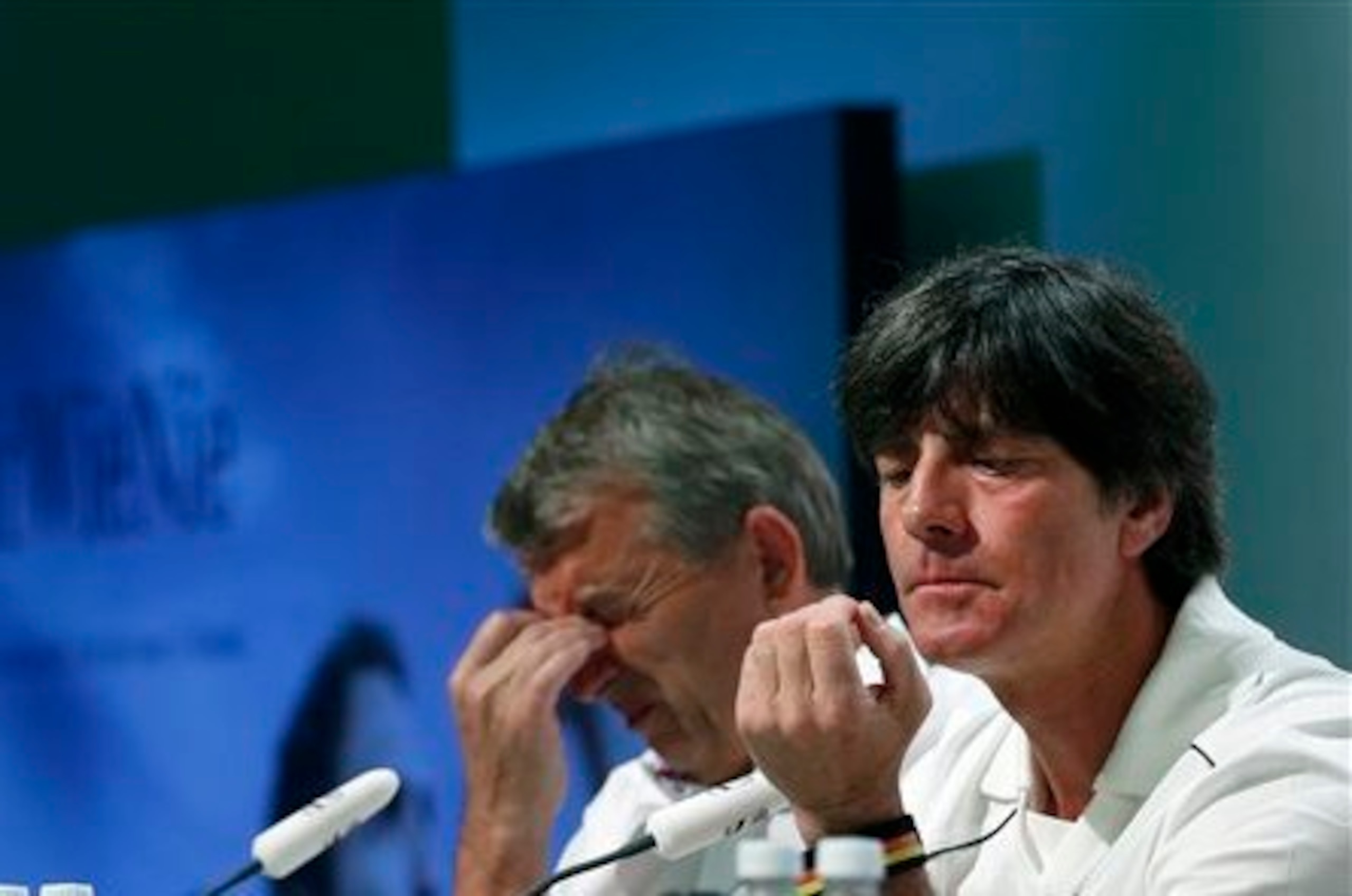 Low carefully picks his words at the press conference.