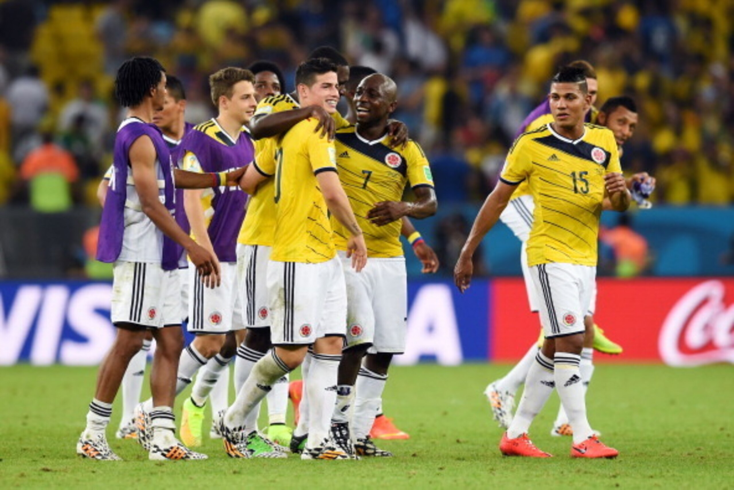 RIO DE JANEIRO, BRAZIL - JUNE 28: James Rodriguez of Colombia celebrates with teammates after defeating Uruguay 2-0 during the 2014 FIFA World Cup Brazil round of 16 match between Colombia and Uruguay at Maracana on June 28, 2014 in Rio de Janeiro, Brazil RIO DE JANEIRO, BRAZIL - JUNE 28: James Rodriguez of Colombia celebrates with teammates after defeating Uruguay 2-0 during the 2014 FIFA World Cup Brazil round of 16 match between Colombia and Uruguay at Maracana on June 28, 2014 in Rio de Janeiro, Brazil