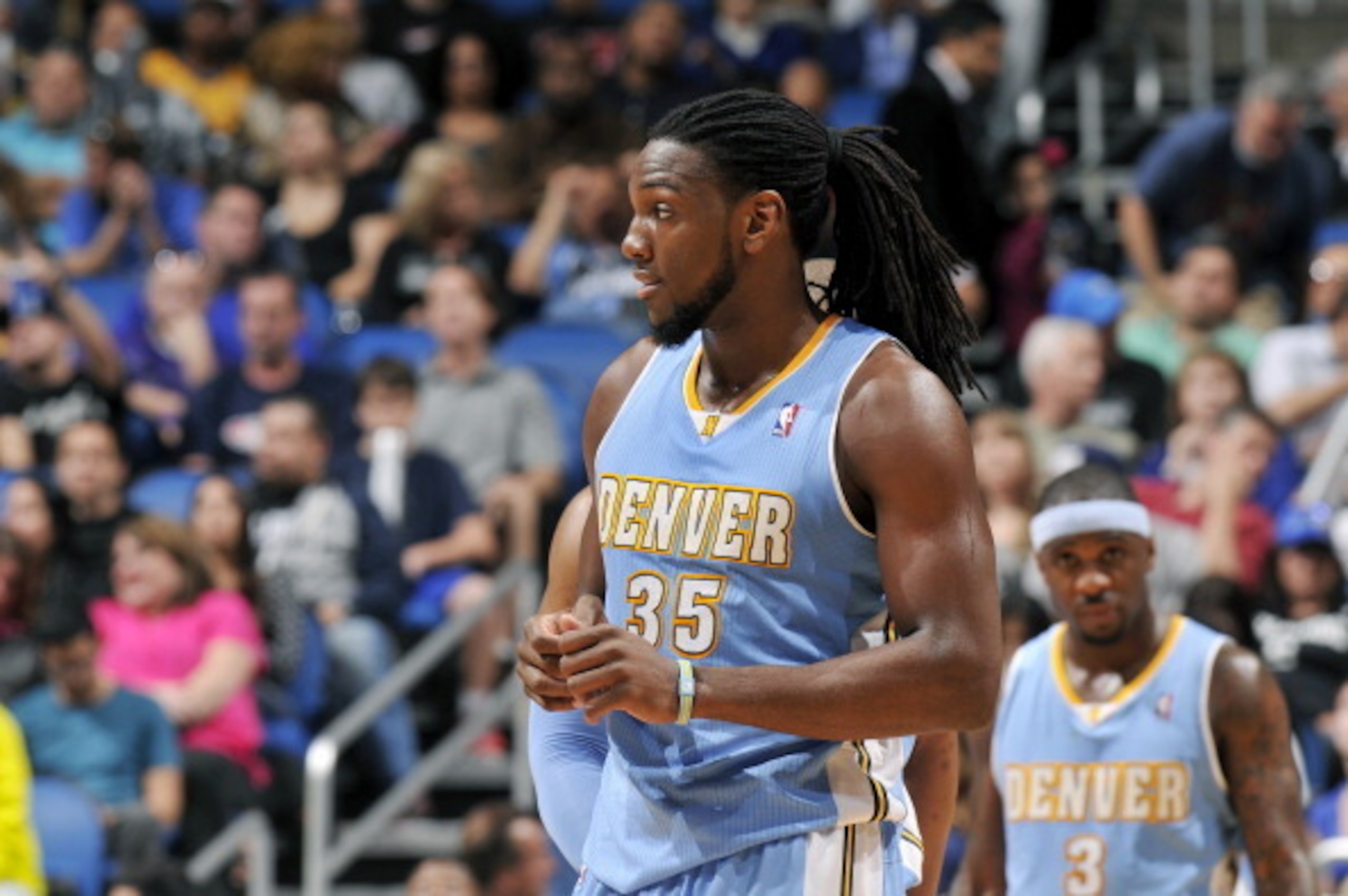 ORLANDO, FL - MARCH 12: Kenneth Faried #35 of the Denver Nuggets stands on the court during a game against the Orlando Magic on March 12, 2014 at Amway Center in Orlando, Florida. NOTE TO USER: User expressly acknowledges and agrees that, by downloading a