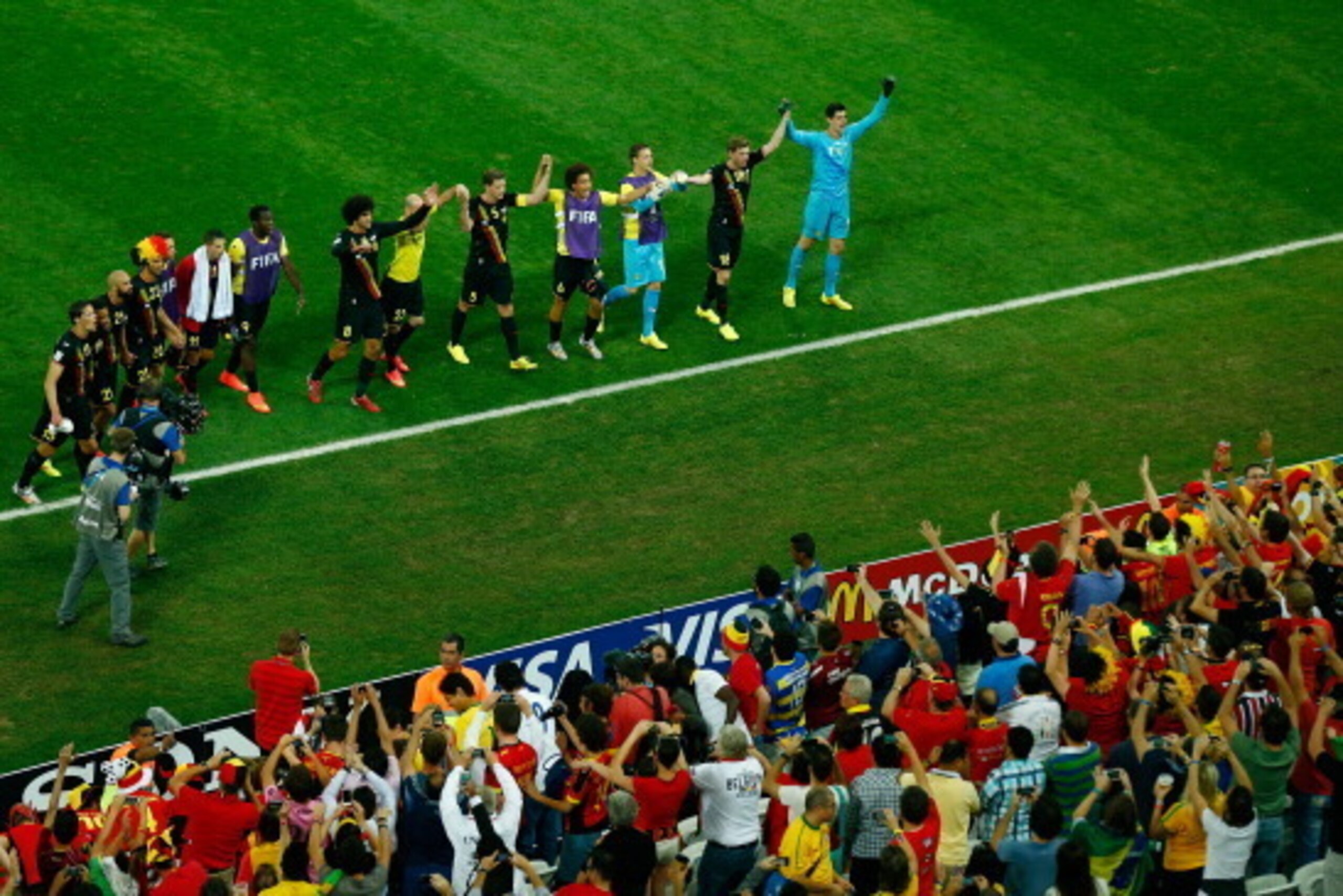 SAO PAULO, BRAZIL - JUNE 26: Belgium players acknowledge the fans after the 2014 FIFA World Cup Brazil Group H match between South Korea and Belgium at Arena de Sao Paulo on June 26, 2014 in Sao Paulo, Brazil. (Photo by Matthew Lewis/Getty Images) SAO PAULO, BRAZIL - JUNE 26: Belgium players acknowledge the fans after the 2014 FIFA World Cup Brazil Group H match between South Korea and Belgium at Arena de Sao Paulo on June 26, 2014 in Sao Paulo, Brazil. (Photo by Matthew Lewis/Getty Images)