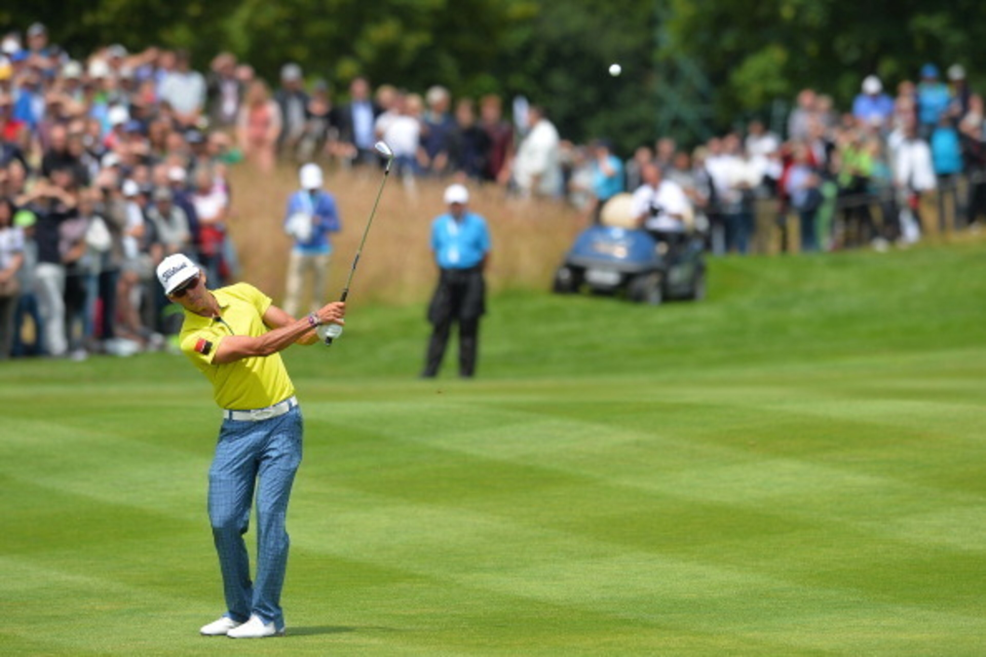 COLOGNE, GERMANY - June 29 : Rafa Cabrera-Bello of Spain plays a chip shot to the 18th green during a play off match between Henrik Stenson of Sweden, Gregory Harvet of France and Fabrizio Zanotti of Paraguay during the fourth round of the BMW Internation