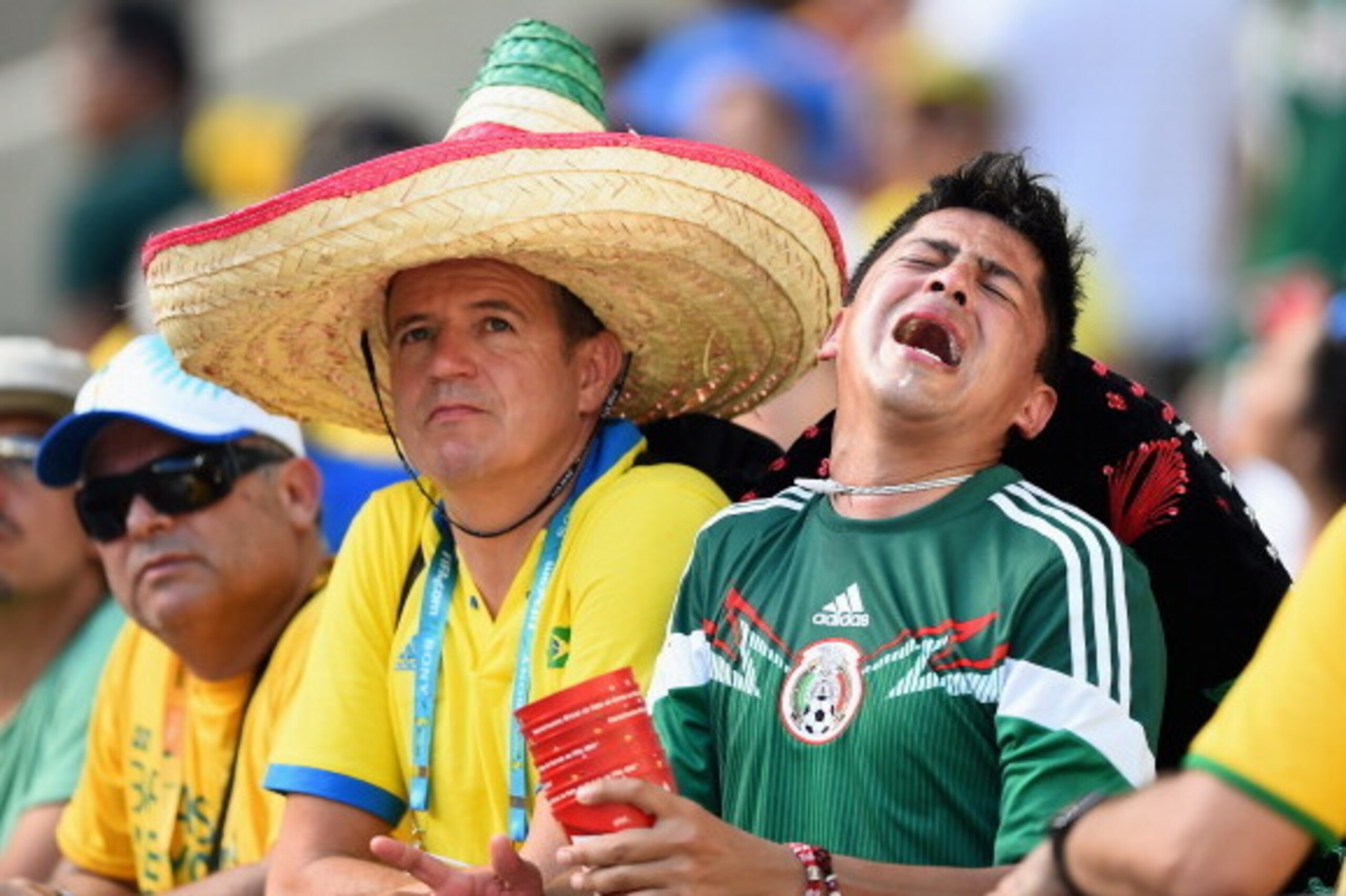 FORTALEZA, BRAZIL - JUNE 29:  A Mexican fan shows his dispair after the 2014 FIFA World Cup Brazil Round of 16 match between Netherlands and Mexico at Castelao on June 29, 2014 in Fortaleza, Brazil.  (Photo by Laurence Griffiths/Getty Images)