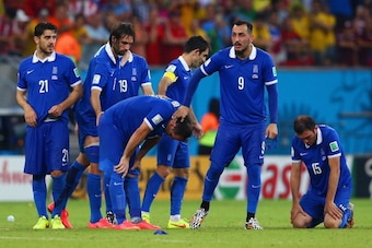 RECIFE, BRAZIL - JUNE 29: (L-R) Konstantinos Katsouranis, Giorgos Samaras, Sokratis Papastathopoulos, Theofanis Gekas, Giorgos Karagounis, Konstantinos Mitroglou and Vasilis Torosidis of Greece react after being defeated by Costa Rica in a penalty shootou