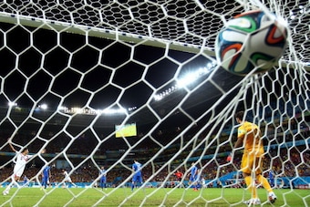 RECIFE, BRAZIL - JUNE 29: Bryan Ruiz of Costa Rica scores his team's first goal past Orestis Karnezis of Greece during the 2014 FIFA World Cup Brazil Round of 16 match between Costa Rica and Greece at Arena Pernambuco on June 29, 2014 in Recife, Brazil.  