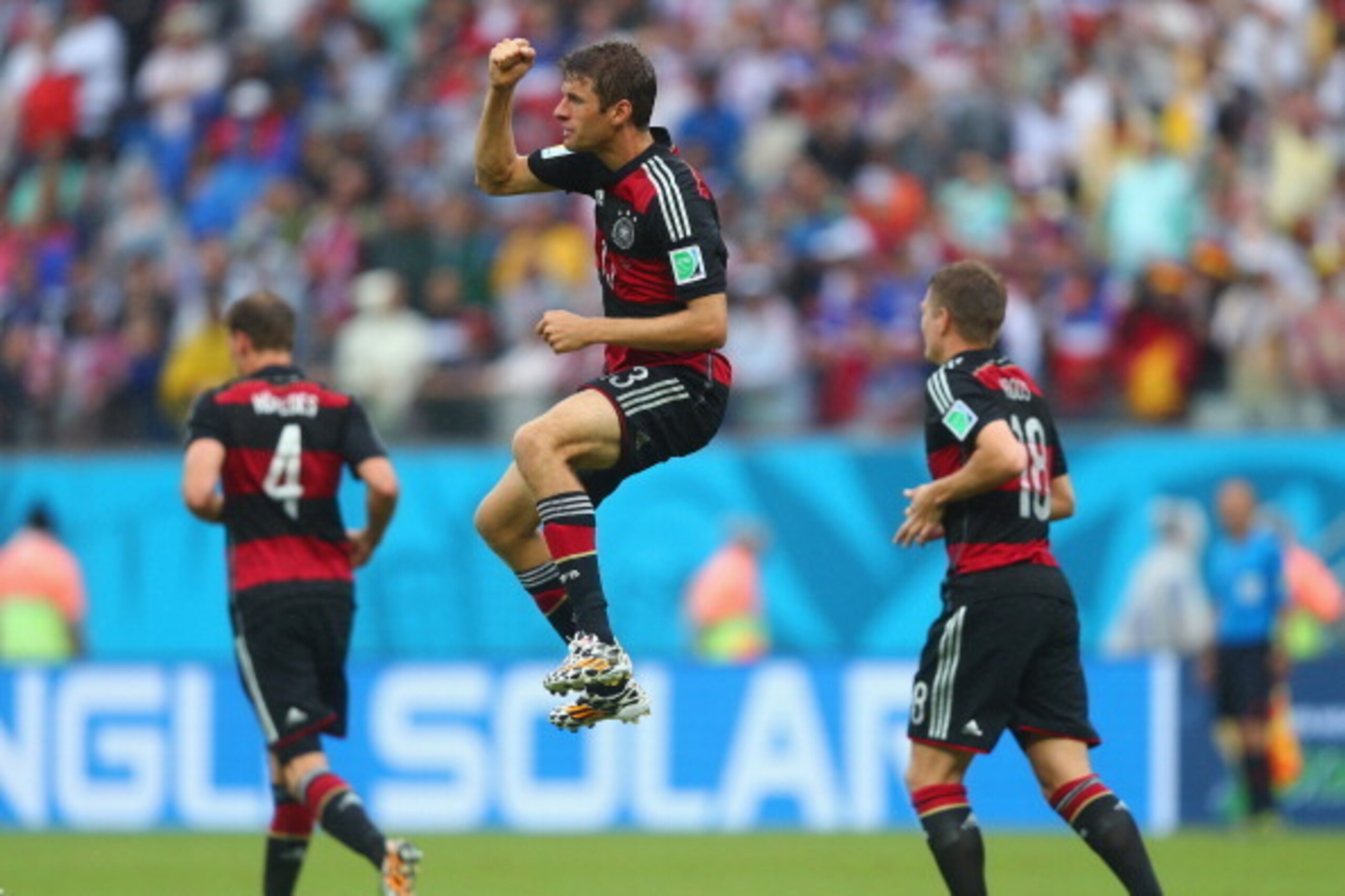 RECIFE, BRAZIL - JUNE 26: Thomas Mueller of Germany (C) celebrates scoring his team's first goal during the 2014 FIFA World Cup Brazil group G match between the United States and Germany at Arena Pernambuco on June 26, 2014 in Recife, Brazil. (Photo by RECIFE, BRAZIL - JUNE 26: Thomas Mueller of Germany (C) celebrates scoring his team's first goal during the 2014 FIFA World Cup Brazil group G match between the United States and Germany at Arena Pernambuco on June 26, 2014 in Recife, Brazil. (Photo by