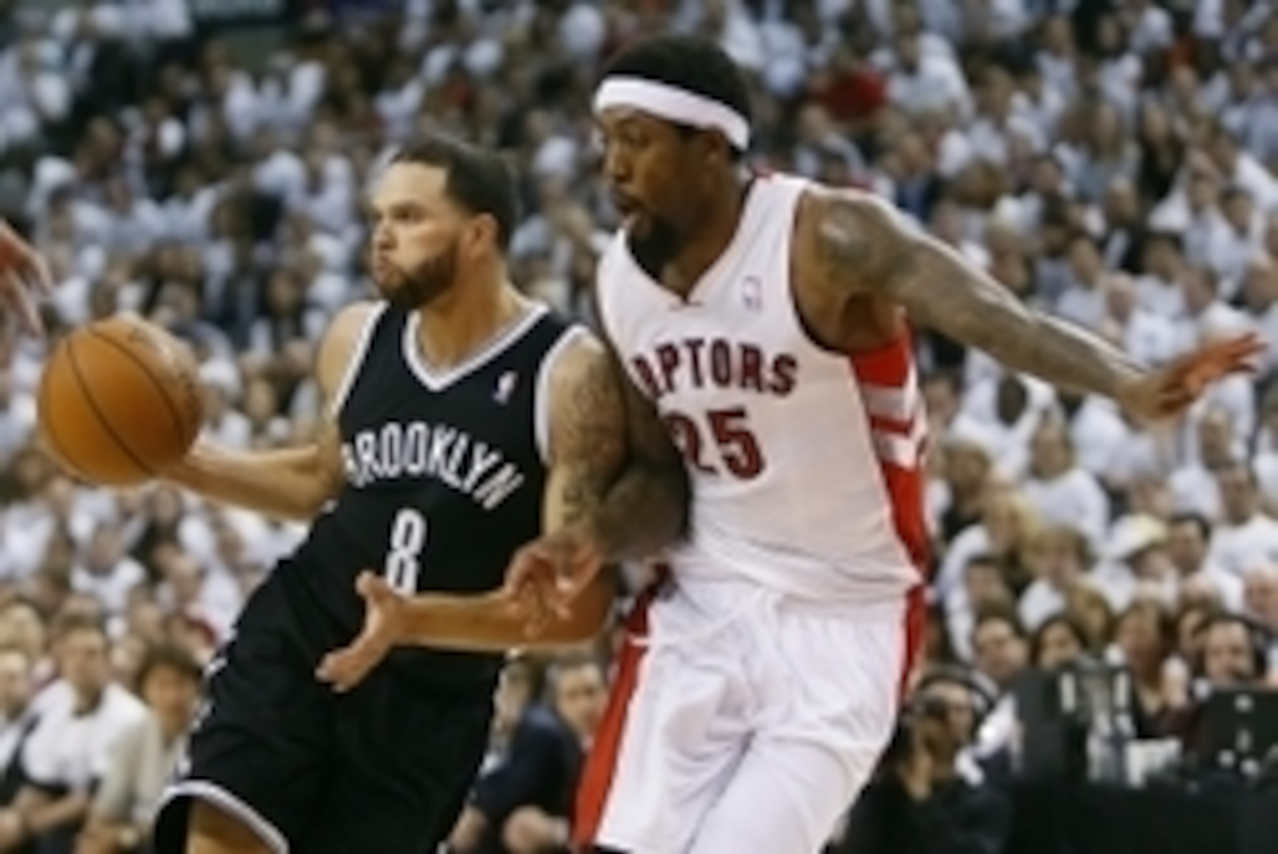 Apr 30, 2014; Toronto, Ontario, CAN; Toronto Raptors guard-forward John Salmons (25) defends against Brooklyn Nets guard Deron Williams (8) in game five of the first round of the 2014 NBA Playoffs at the Air Canada Centre. Toronto defeated Brooklyn 115-11
