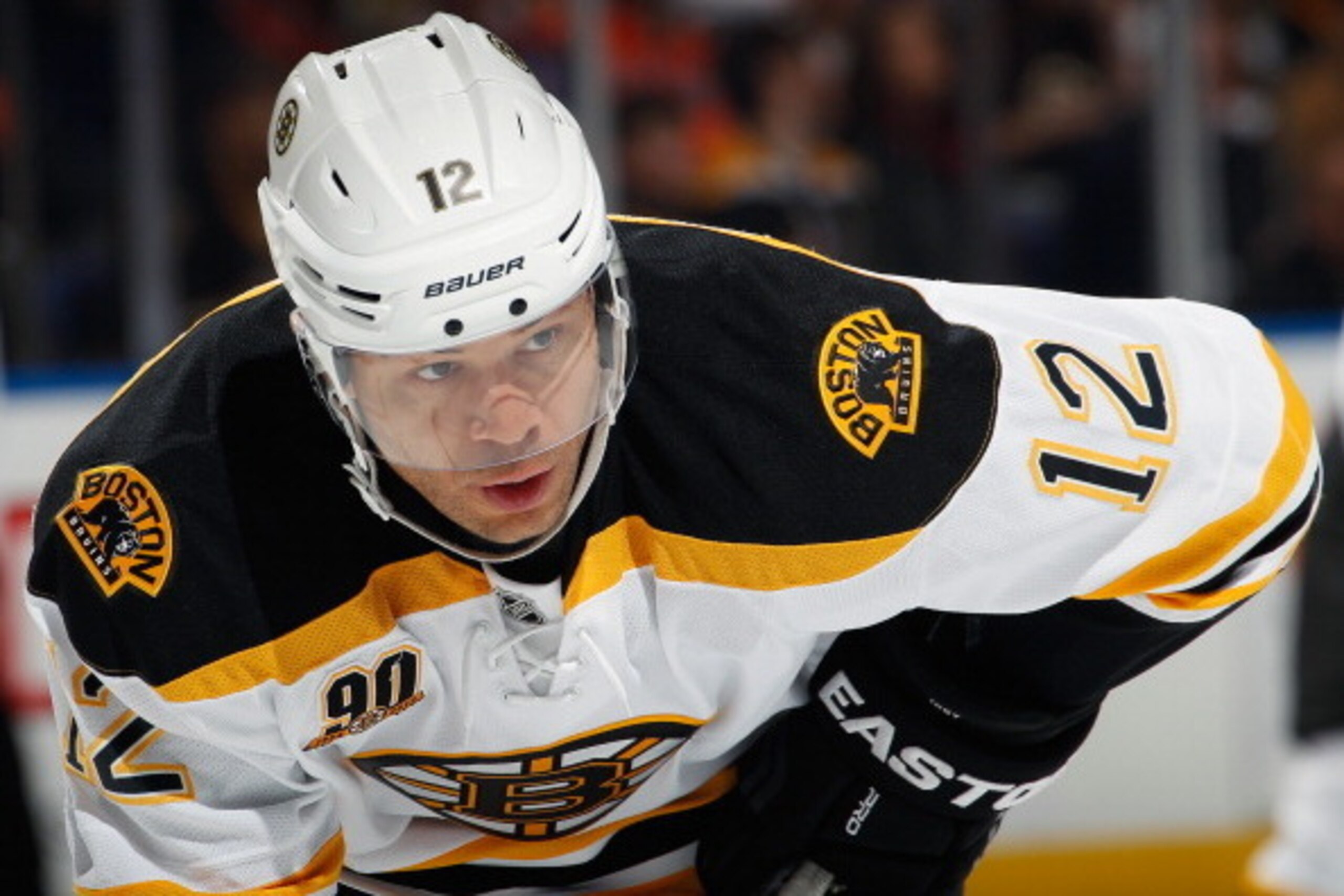 UNIONDALE, NY - JANUARY 27:  Jarome Iginla #12 of the Boston Bruins waits for a face off in an NHL hockey game against the New York Islanders at Nassau Veterans Memorial Coliseum on January 27, 2014 in Uniondale, New York.  (Photo by Paul Bereswill/Getty 