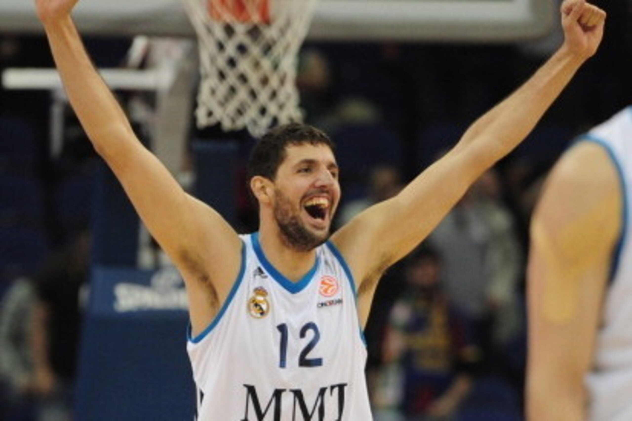 LONDON, ENGLAND - MAY 10:  Nikola Mirotic of Real Madrid celebrates victory during the Turkish Airlines EuroLeague Final Four semi final game between FC Barcelona Regan and Real Madrid at the O2 Arena on May 10, 2013 in London, England.  (Photo by Jamie M