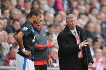 SUNDERLAND, ENGLAND - OCTOBER 02:  Manchester United manager Sir Alex Ferguson talks to Bebe before sending him on during the Barclays Premier League match between Sunderland and Manchester United at the Stadium of Light on October 2, 2010 in Sunderland,