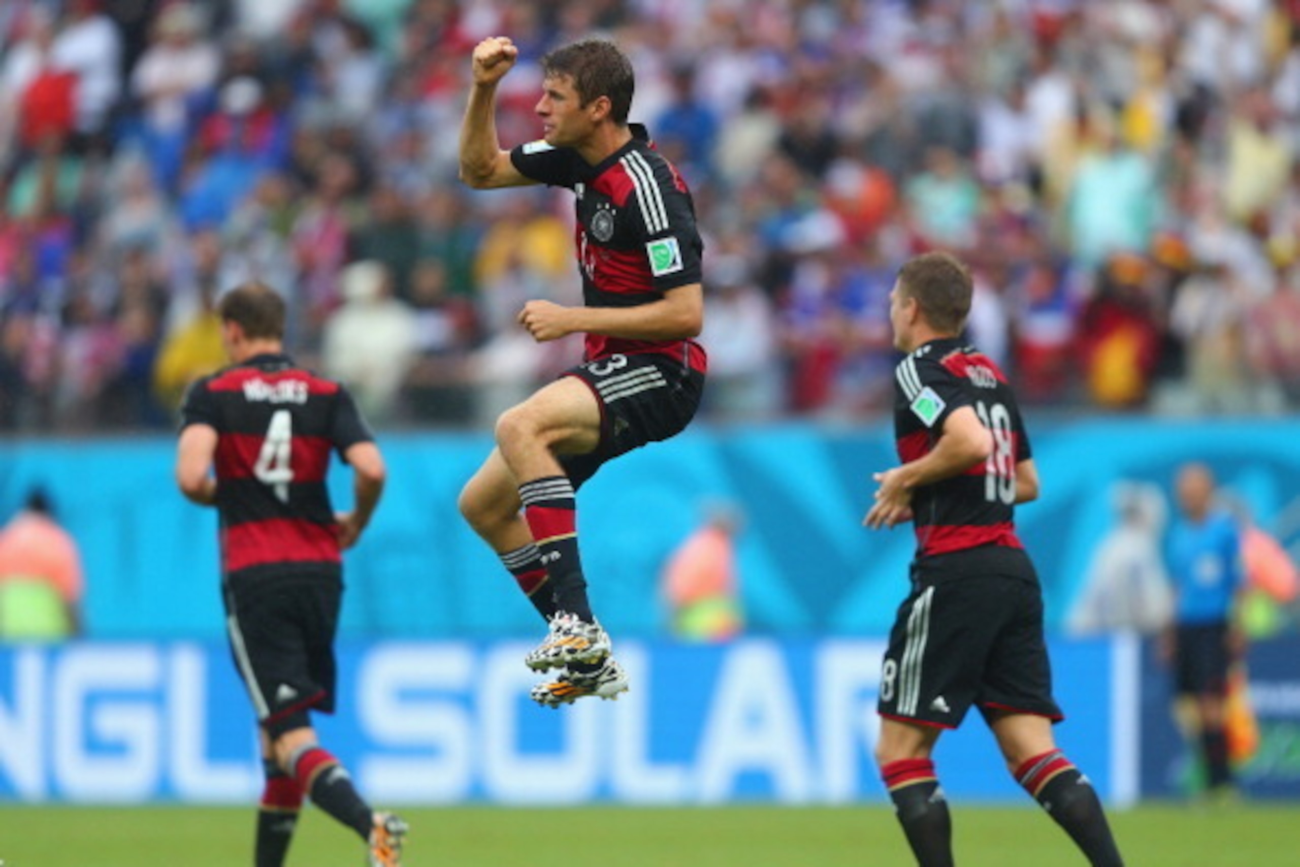 RECIFE, BRAZIL - JUNE 26:  Thomas Mueller of Germany (C) celebrates scoring his team's first goal during the 2014 FIFA World Cup Brazil group G match between the United States and Germany at Arena Pernambuco on June 26, 2014 in Recife, Brazil.  (Photo by 