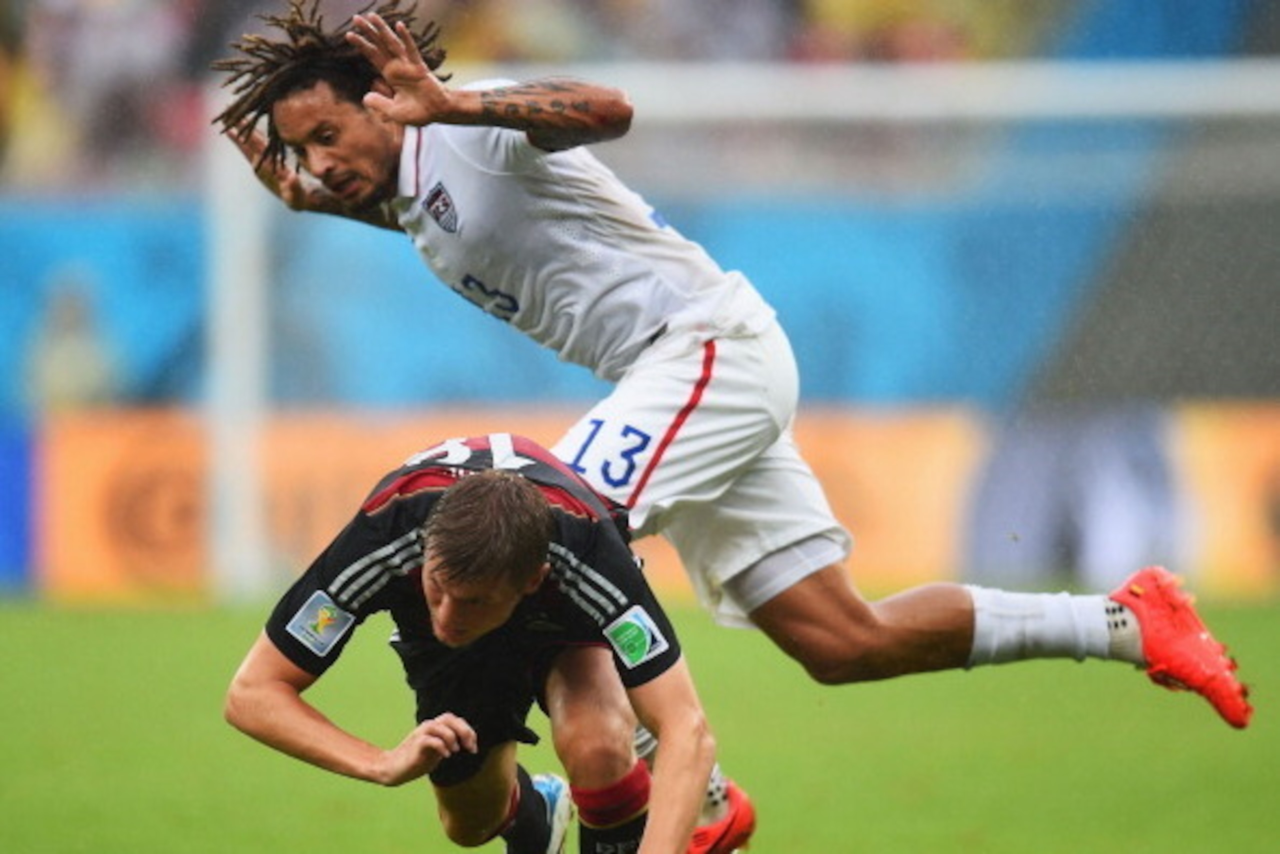 RECIFE, BRAZIL - JUNE 26: Jermaine Jones of the United States collides with Thomas Mueller of Germany during the 2014 FIFA World Cup Brazil group G match between the United States and Germany at Arena Pernambuco on June 26, 2014 in Recife, Brazil.  (Photo