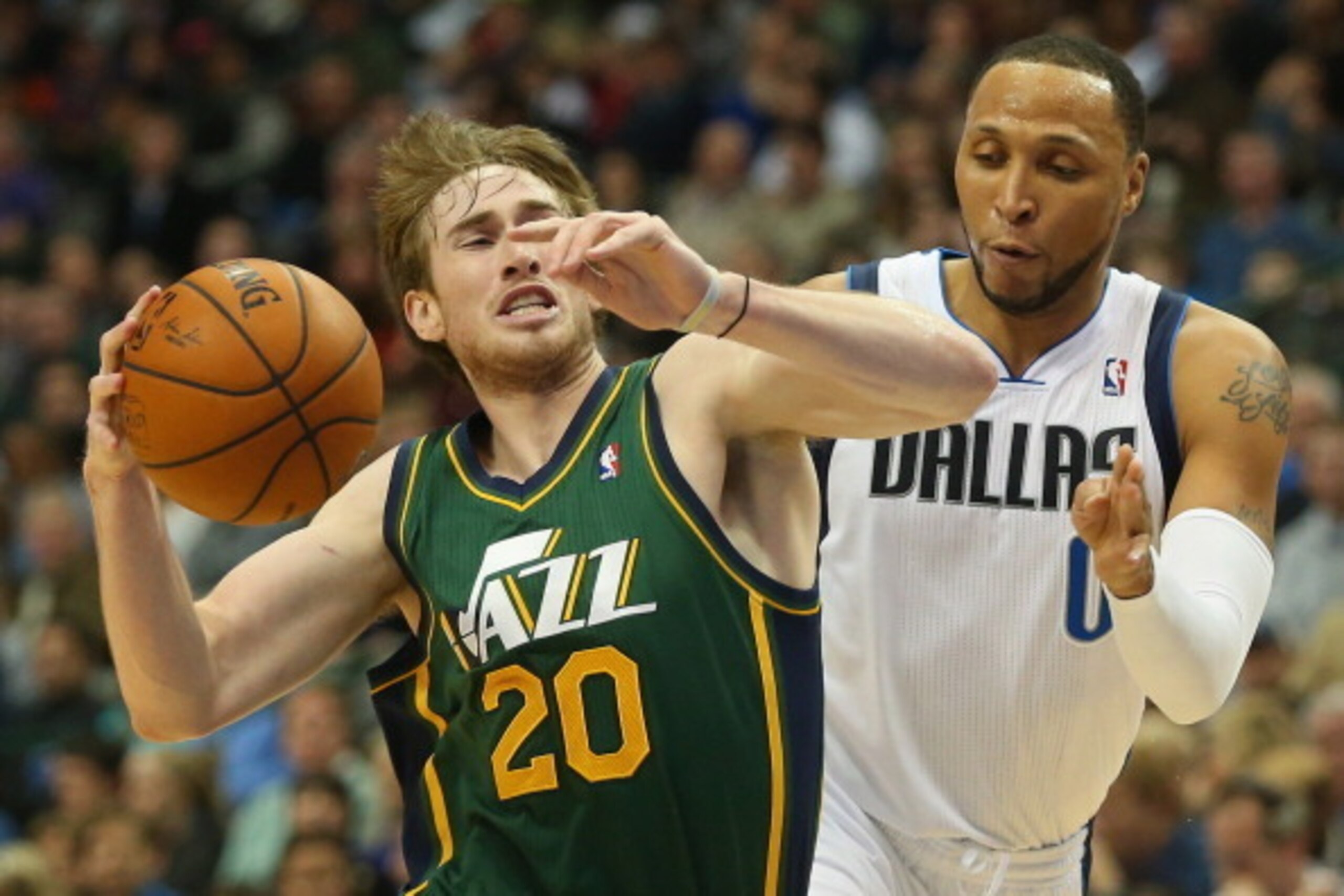 DALLAS, TX - FEBRUARY 07: Gordon Hayward #20 of the Utah Jazz dribbles the ball past Shawn Marion #0 of the Dallas Mavericks at American Airlines Center on February 7, 2014 in Dallas, Texas. NOTE TO USER: User expressly acknowledges and agrees that, by DALLAS, TX - FEBRUARY 07: Gordon Hayward #20 of the Utah Jazz dribbles the ball past Shawn Marion #0 of the Dallas Mavericks at American Airlines Center on February 7, 2014 in Dallas, Texas. NOTE TO USER: User expressly acknowledges and agrees that, by