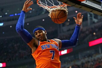 CHICAGO, IL - OCTOBER 31: Carmelo Anthony #7 of the New York Knicks dunks against the Chicago Bulls at the United Center on October 31, 2013 in Chicago, Illinois. NOTE TO USER: User expressly acknowledges and agrees that, by downloading and or using this 