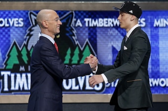 LaVine greets NBA commissioner Adam Silver.