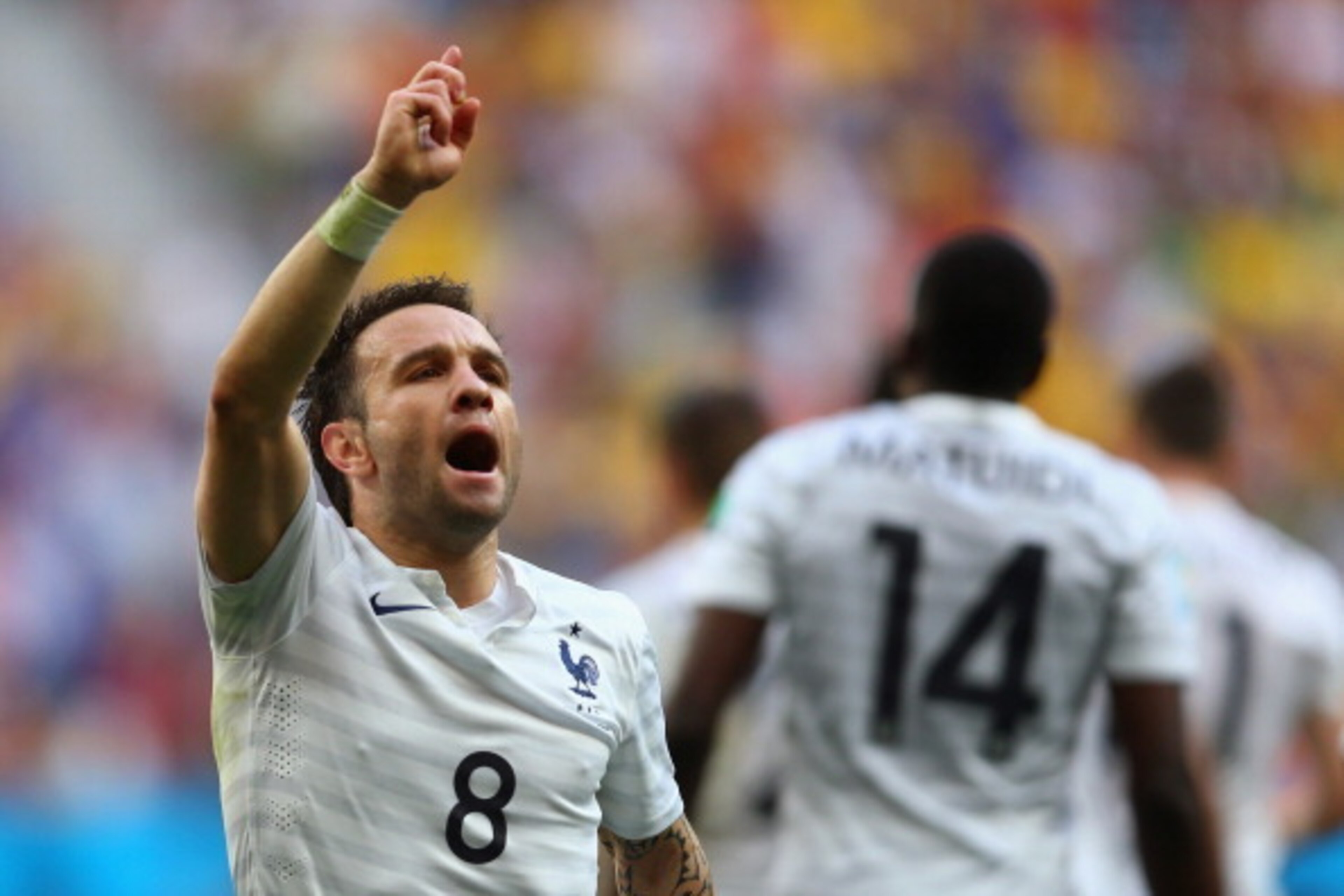 BRASILIA, BRAZIL - JUNE 30: Mathieu Valbuena of France celebrates his team's first goal by Paul Pogba (not pictured) during the 2014 FIFA World Cup Brazil Round of 16 match between France and Nigeria at Estadio Nacional on June 30, 2014 in Brasilia, Brazi BRASILIA, BRAZIL - JUNE 30: Mathieu Valbuena of France celebrates his team's first goal by Paul Pogba (not pictured) during the 2014 FIFA World Cup Brazil Round of 16 match between France and Nigeria at Estadio Nacional on June 30, 2014 in Brasilia, Brazi