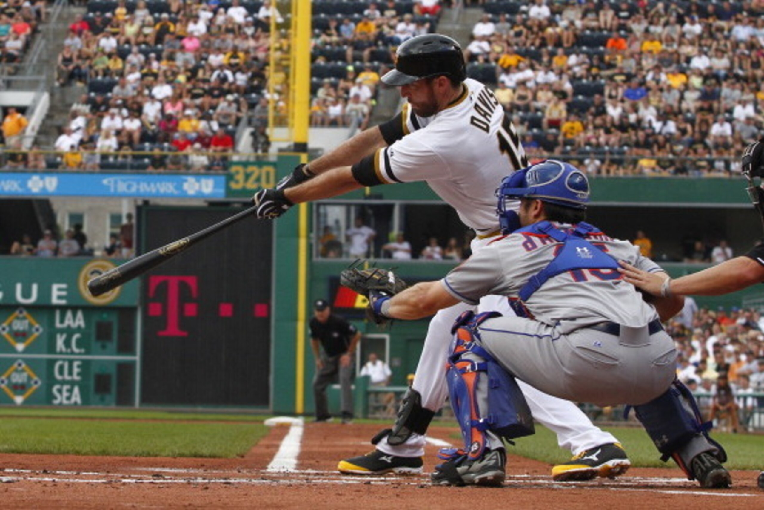 PITTSBURGH, PA - JUNE 29:  Ike Davis #15 of the Pittsburgh Pirates hits a two RBI single in the first inning against the New York Mets during the game at PNC Park on June 29, 2014 in Pittsburgh, Pennsylvania.  (Photo by Justin K. Aller/Getty Images)