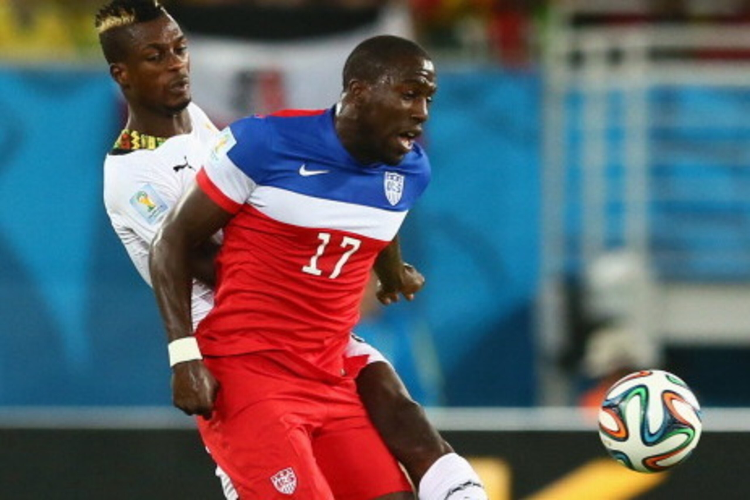 NATAL, BRAZIL - JUNE 16:  Jozy Altidore of the United States fights off John Boye of Ghana during the 2014 FIFA World Cup Brazil Group G match between Ghana and the United States at Estadio das Dunas on June 16, 2014 in Natal, Brazil.  (Photo by Kevin C. 