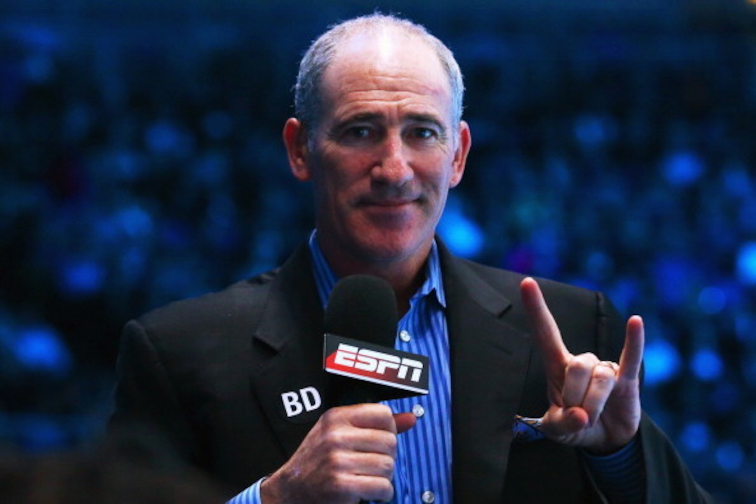 LONDON, ENGLAND - NOVEMBER 07: Brad Gilbert makes a sign as he covers the men's singles match between Juan Martin Del Potro of Argentina and Novak Djokovic of Serbia during day four of the Barclays ATP World Tour Finals at O2 Arena on November 7, 2013 in 