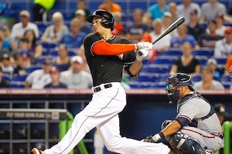 One imagines that it would take more than Jarred Cosart and Delino DeShields Jr. to land Giancarlo Stanton from the Miami Marlins.