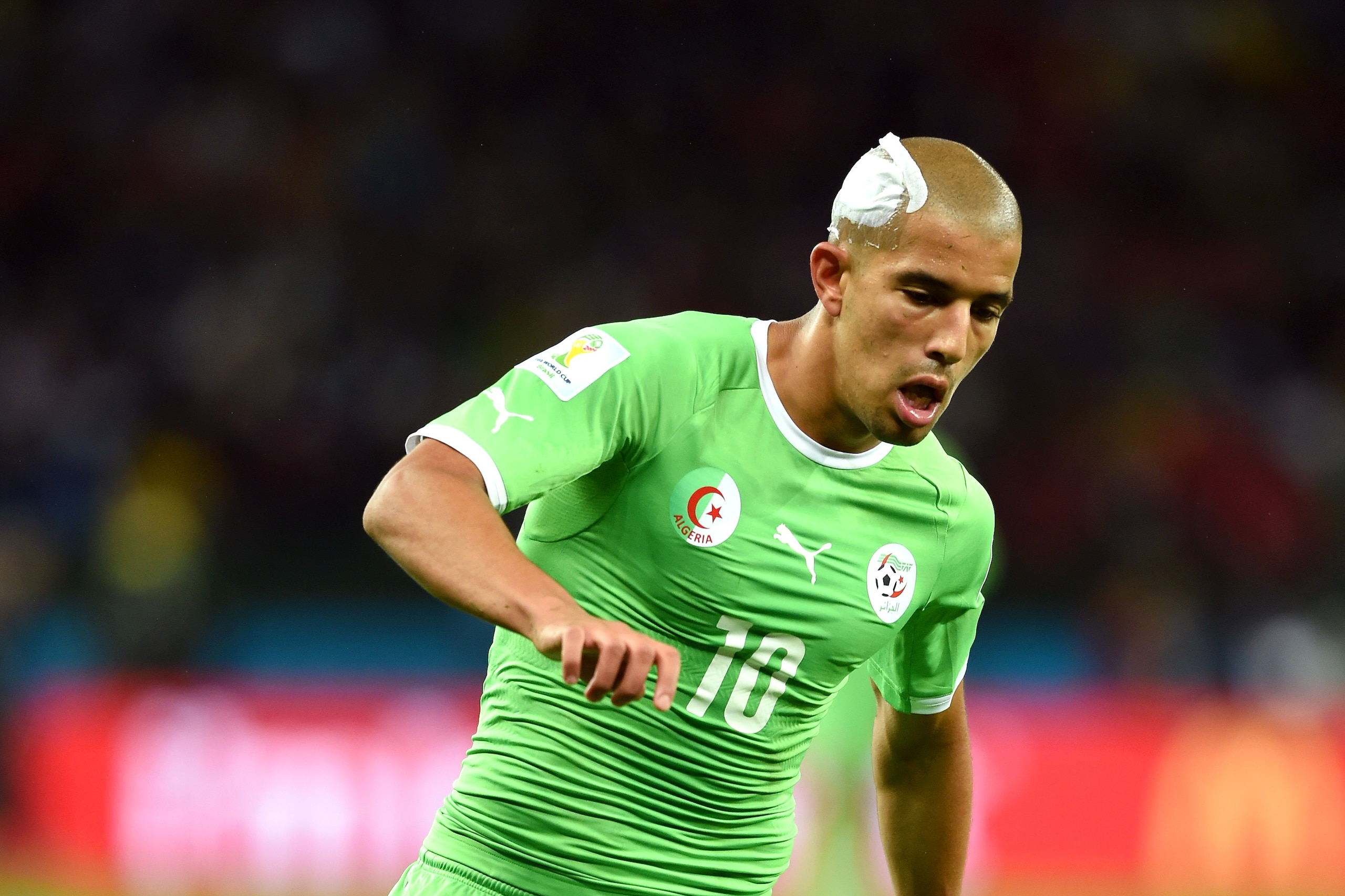 PORTO ALEGRE, BRAZIL - JUNE 30: Sofiane Feghouli of Algeria controls the ball during the 2014 FIFA World Cup Brazil Round of 16 match between Germany and Algeria at Estadio Beira-Rio on June 30, 2014 in Porto Alegre, Brazil. (Photo by Matthias Hangst/Get PORTO ALEGRE, BRAZIL - JUNE 30: Sofiane Feghouli of Algeria controls the ball during the 2014 FIFA World Cup Brazil Round of 16 match between Germany and Algeria at Estadio Beira-Rio on June 30, 2014 in Porto Alegre, Brazil. (Photo by Matthias Hangst/Get
