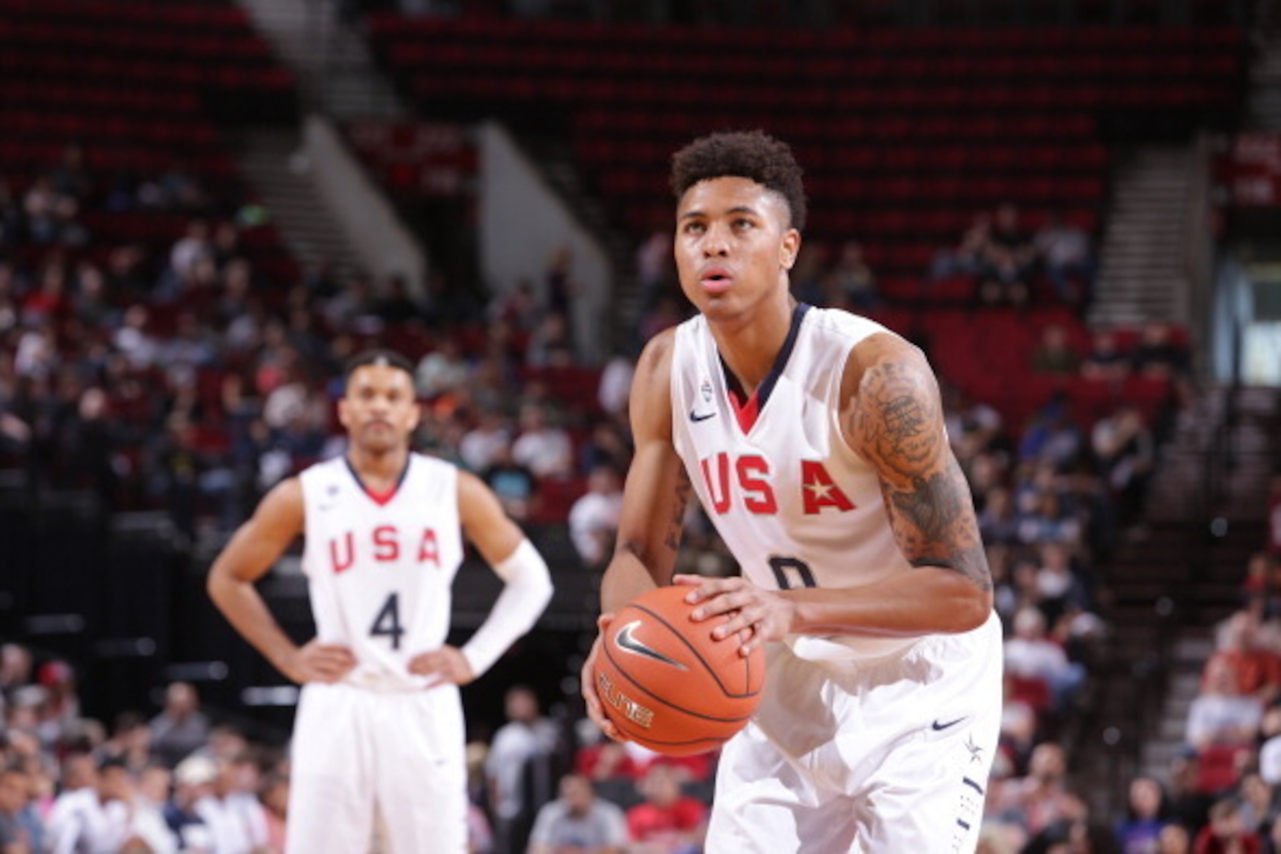 PORTLAND, OR - APRIL 12:  Kelly Oubre #8 of Team USA shoots the ball against the World Team on April 12, 2014 at the Moda Center Arena in Portland, Oregon. NOTE TO USER: User expressly acknowledges and agrees that, by downloading and or using this photogr