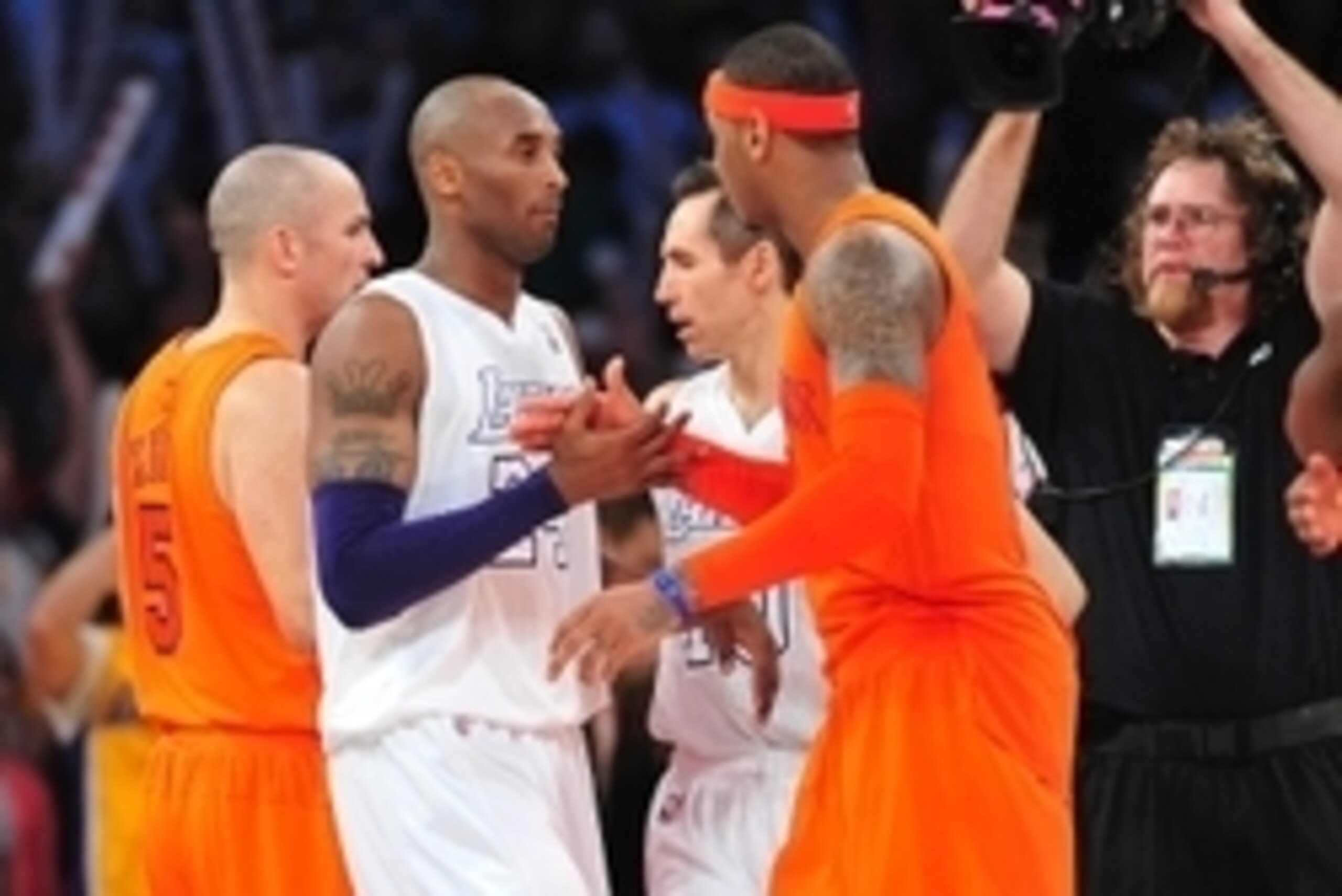 December 25, 2012; Los Angeles, CA, USA; Los Angeles Lakers shooting guard Kobe Bryant (24) greets New York Knicks small forward Carmelo Anthony (7) following the 100-94 victory at Staples Center. Mandatory Credit: Gary A. Vasquez-USA TODAY Sports