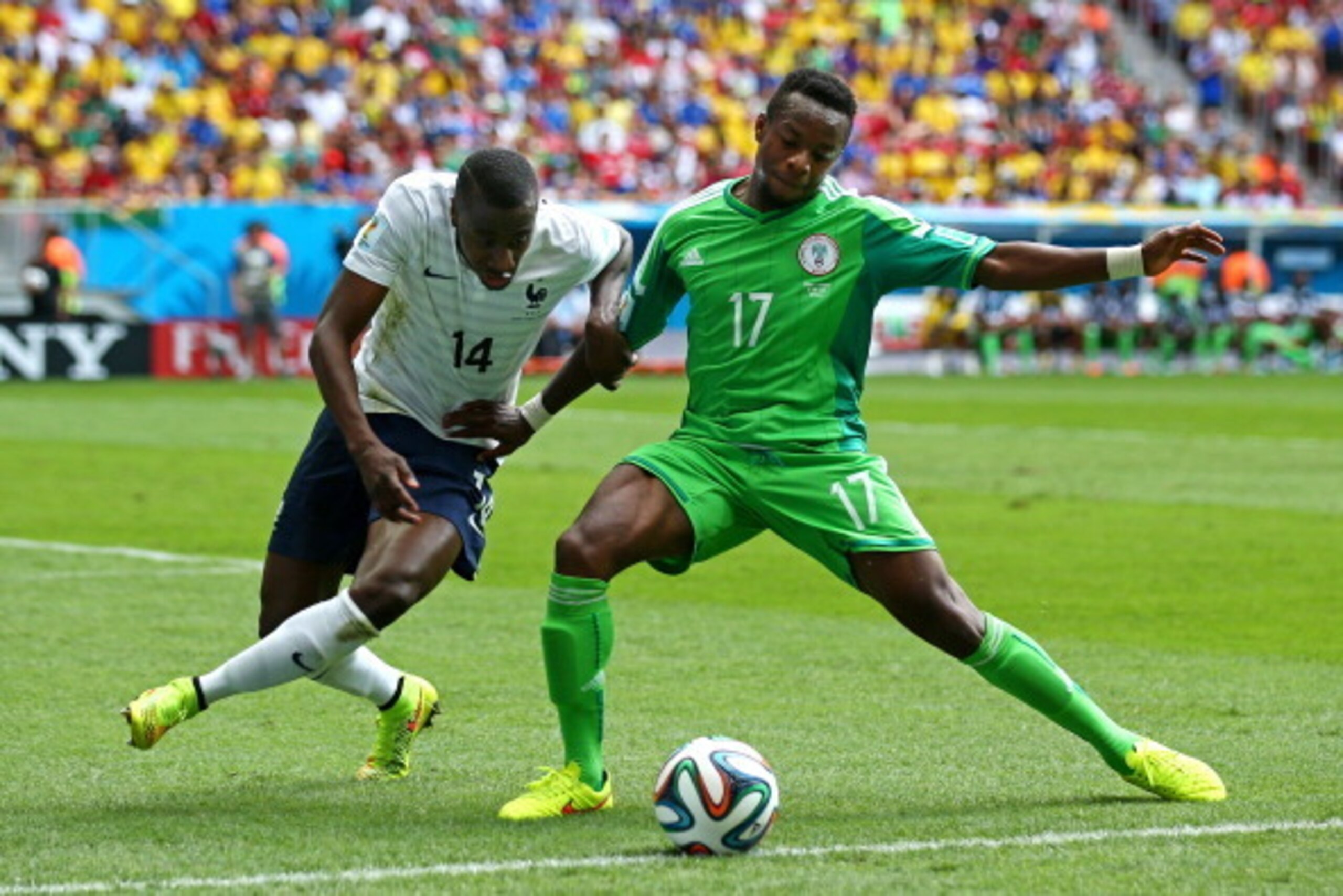 BRASILIA, BRAZIL - JUNE 30: Blaise Matuidi of France challenges Ogenyi Onazi of Nigeria during the 2014 FIFA World Cup Brazil Round of 16 match between France and Nigeria at Estadio Nacional on June 30, 2014 in Brasilia, Brazil.  (Photo by Ian Walton/Gett
