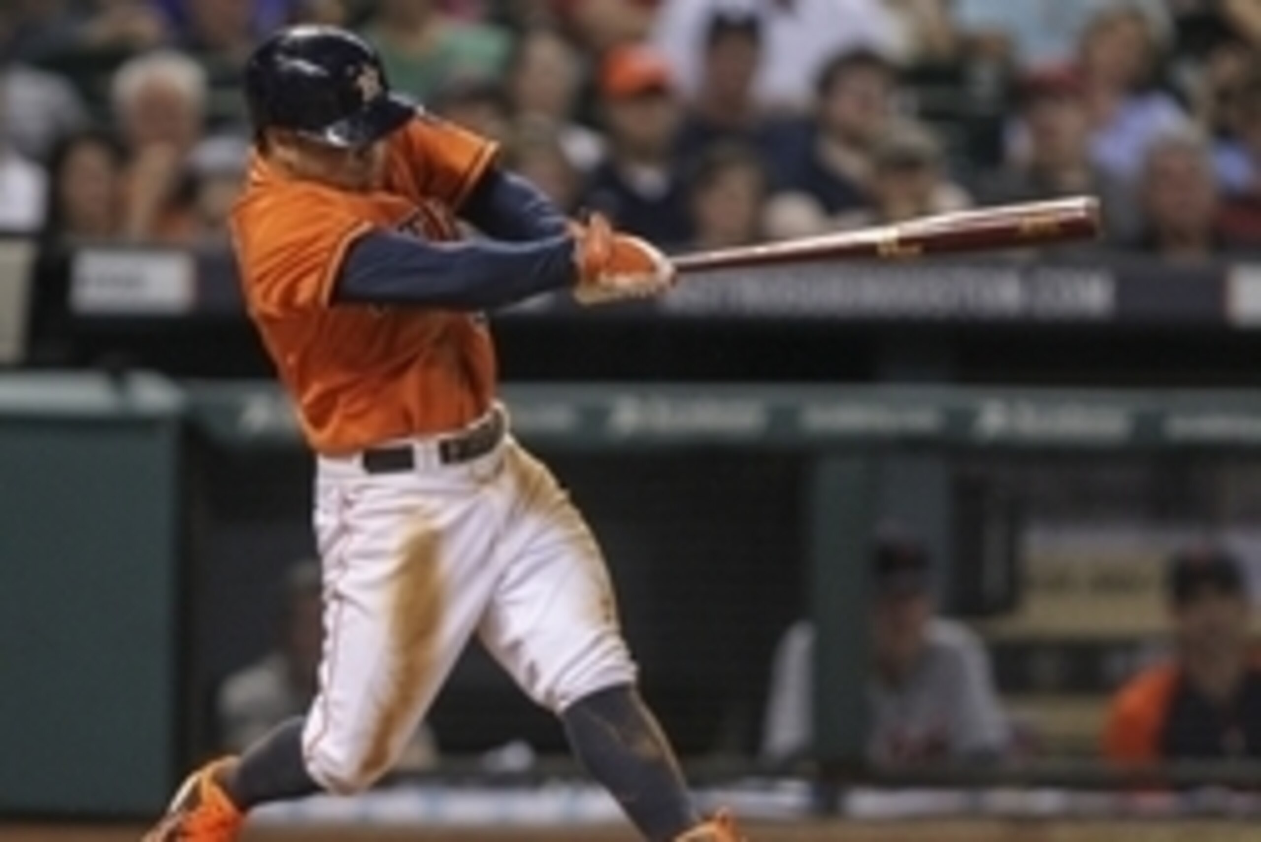Jun 27, 2014; Houston, TX, USA; Houston Astros second baseman Jose Altuve (27) hits a double during the fifth inning against the Detroit Tigers at Minute Maid Park. Mandatory Credit: Troy Taormina-USA TODAY Sports