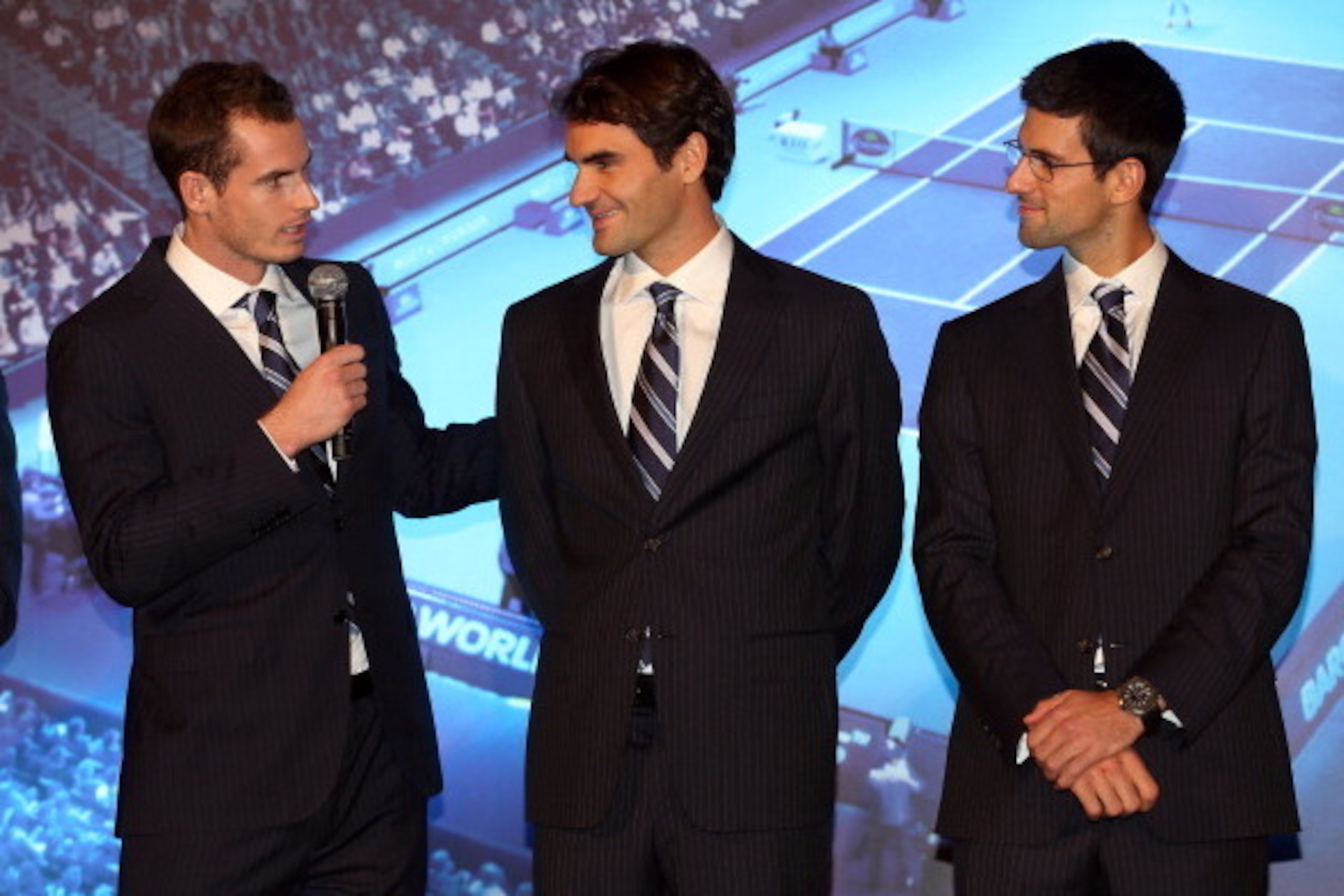 LONDON, ENGLAND - NOVEMBER 03:  (L-R) Andy Murray of Great Britain, Roger Federer of Switzerland and Novak Djokovic of Serbia talk to the guests during previews for the ATP World Tour Finals Tennis on November 3, 2012 in London, England. The world's top e