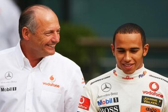 SHANGHAI, CHINA - OCTOBER 05:  McLaren Mercedes Team Principal Ron Dennis (L) and driver Lewis Hamilton of Great Britain and McLaren Mercedes walk in the paddock during practice for the Chinese Formula One Grand Prix at the Shanghai International Circuit 