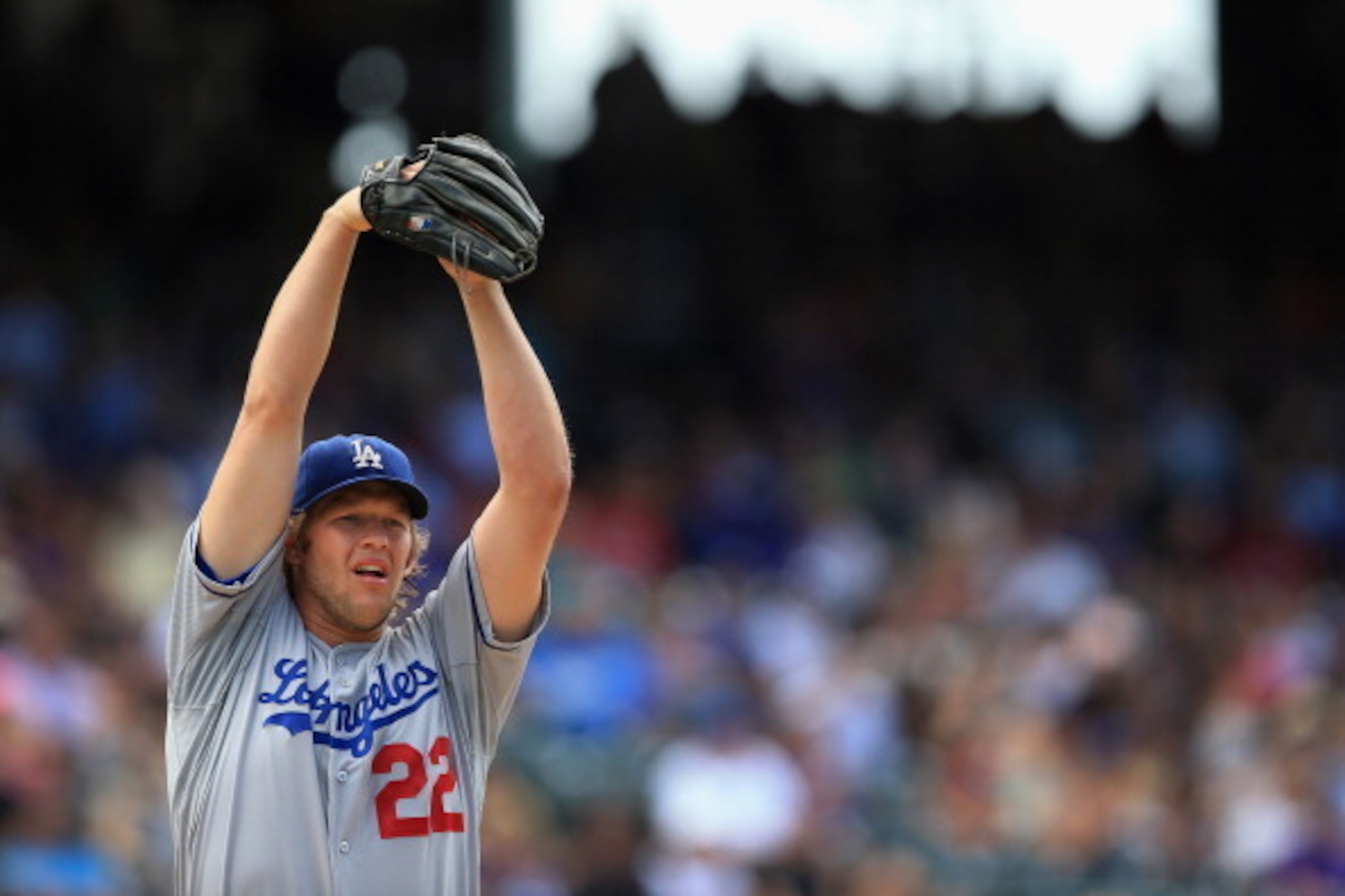 DENVER, CO - SEPTEMBER 02:  Starting pitcher Clayton Kershaw #22 of the Los Angeles Dodgers works against the Colorado Rockies at Coors Field on September 2, 2013 in Denver, Colorado. Kershaw earned the win as the Dodgers defeated the Rockies 10-8.  (Phot